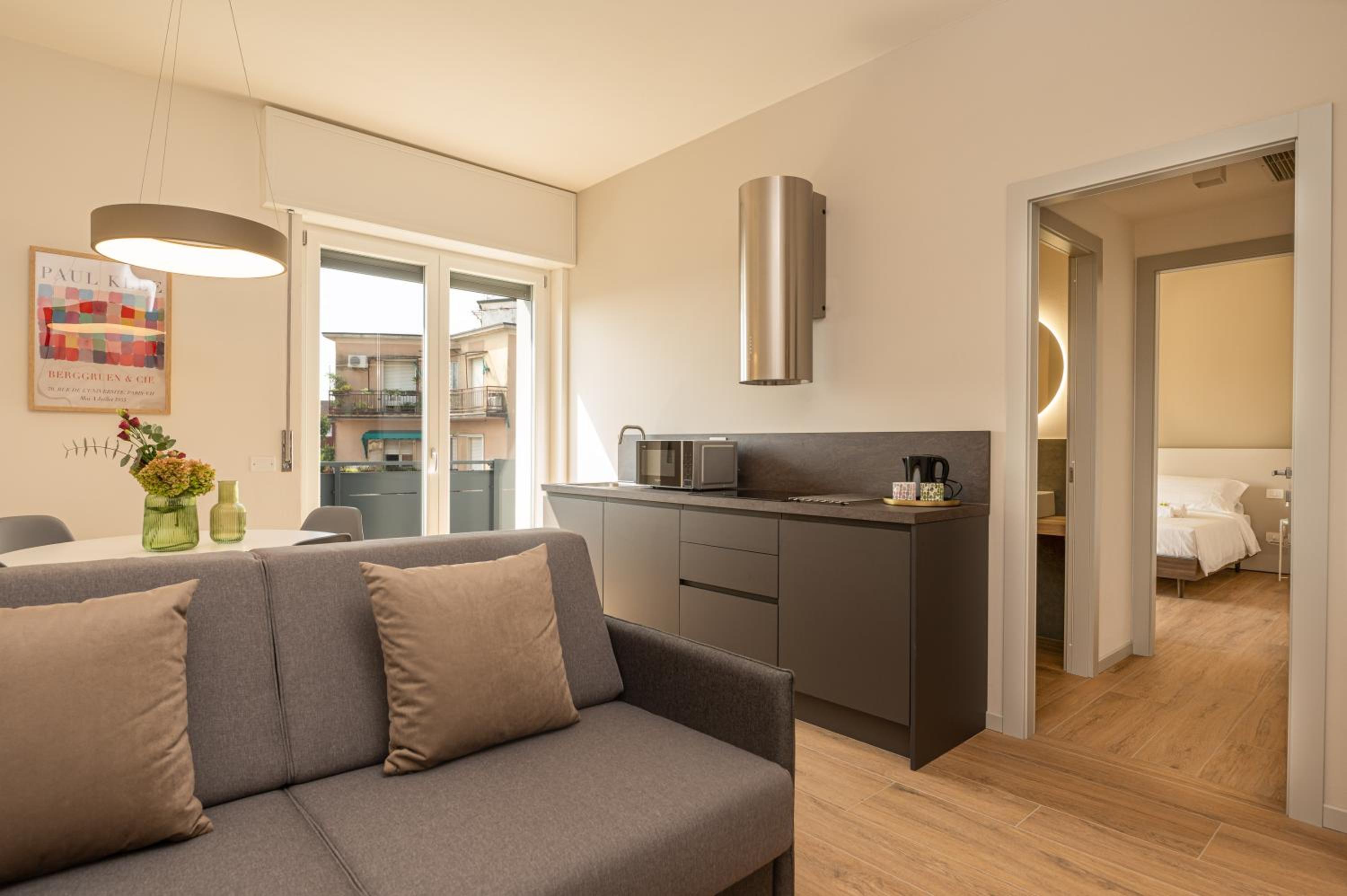 One-Bedroom Apartment with Balcony and City View