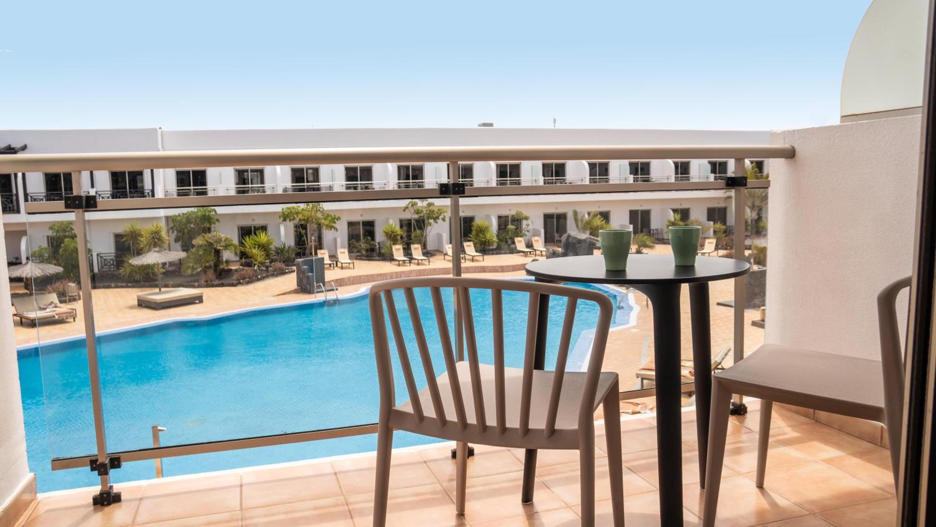 Double Room with Pool View (2 Adults) photo 2