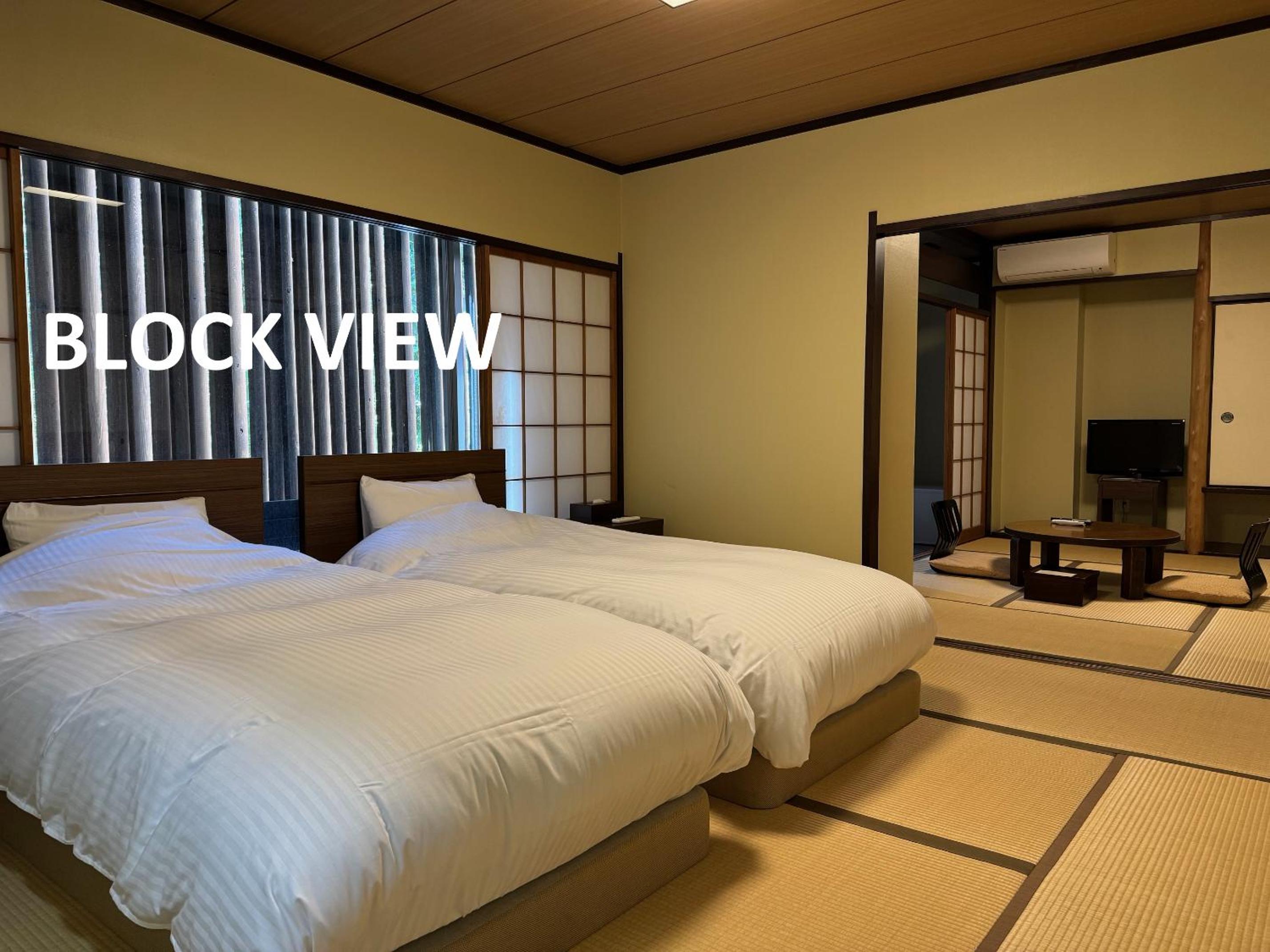 Standard Twin Room - Photo 1