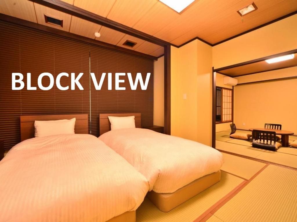 Twin Room with Private Bathroom - Photo 2