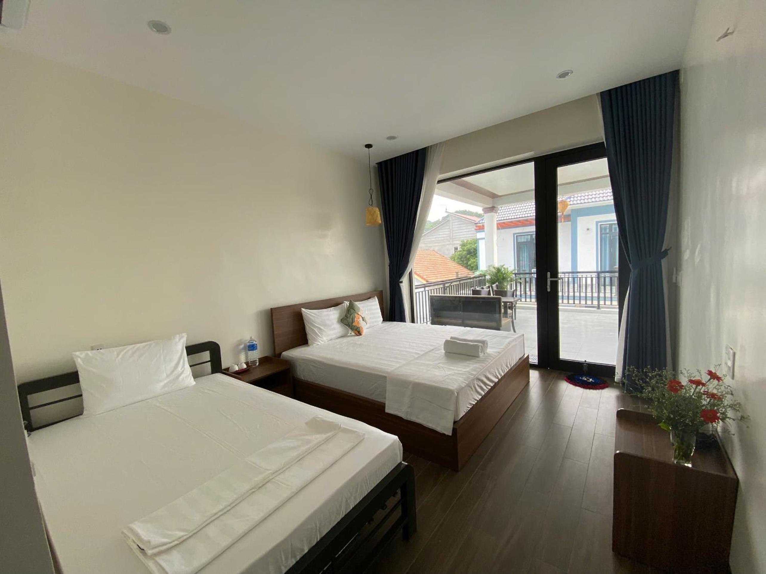 Deluxe Triple Room - Photo 11