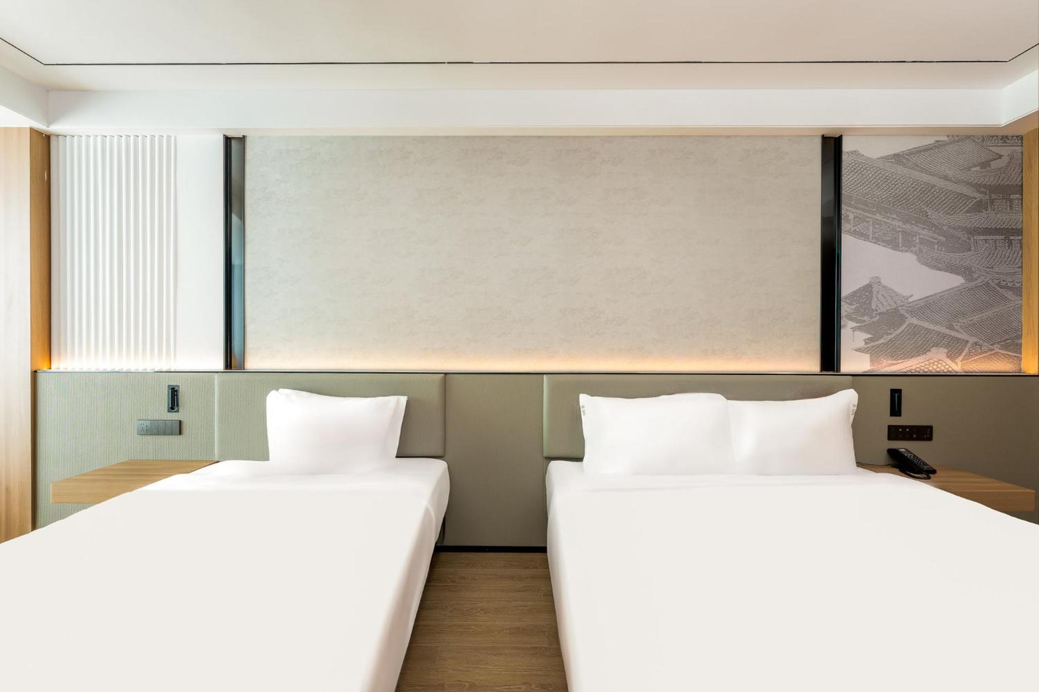 Standard Room with One Double and One King Bed
