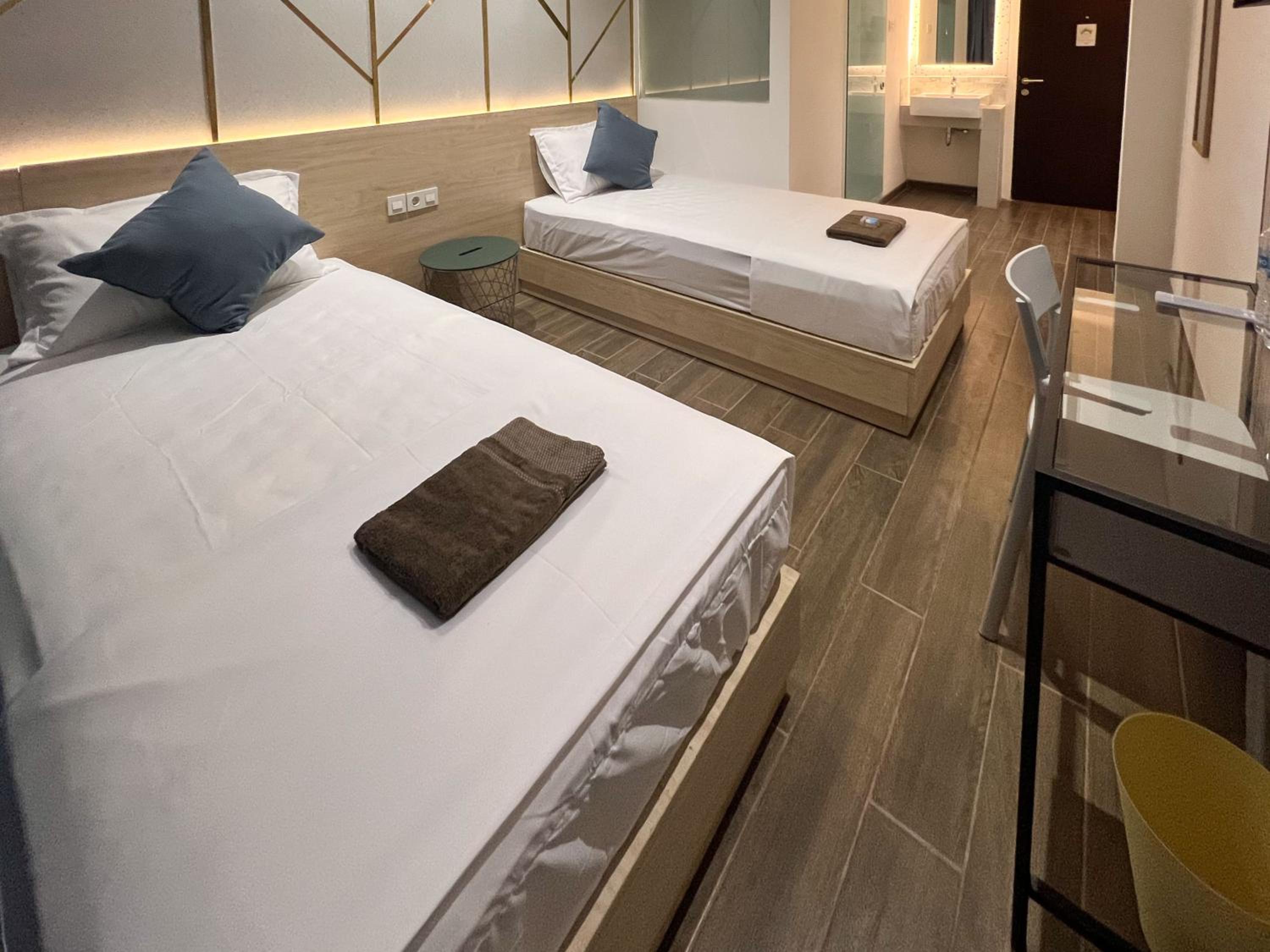 Deluxe Twin Room - Photo 7