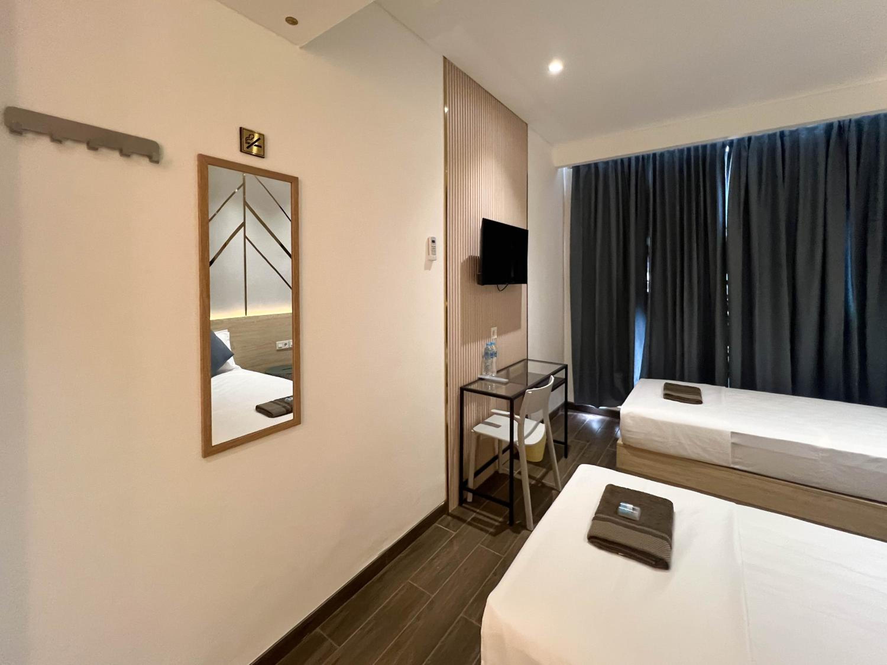Deluxe Twin Room - Photo 10