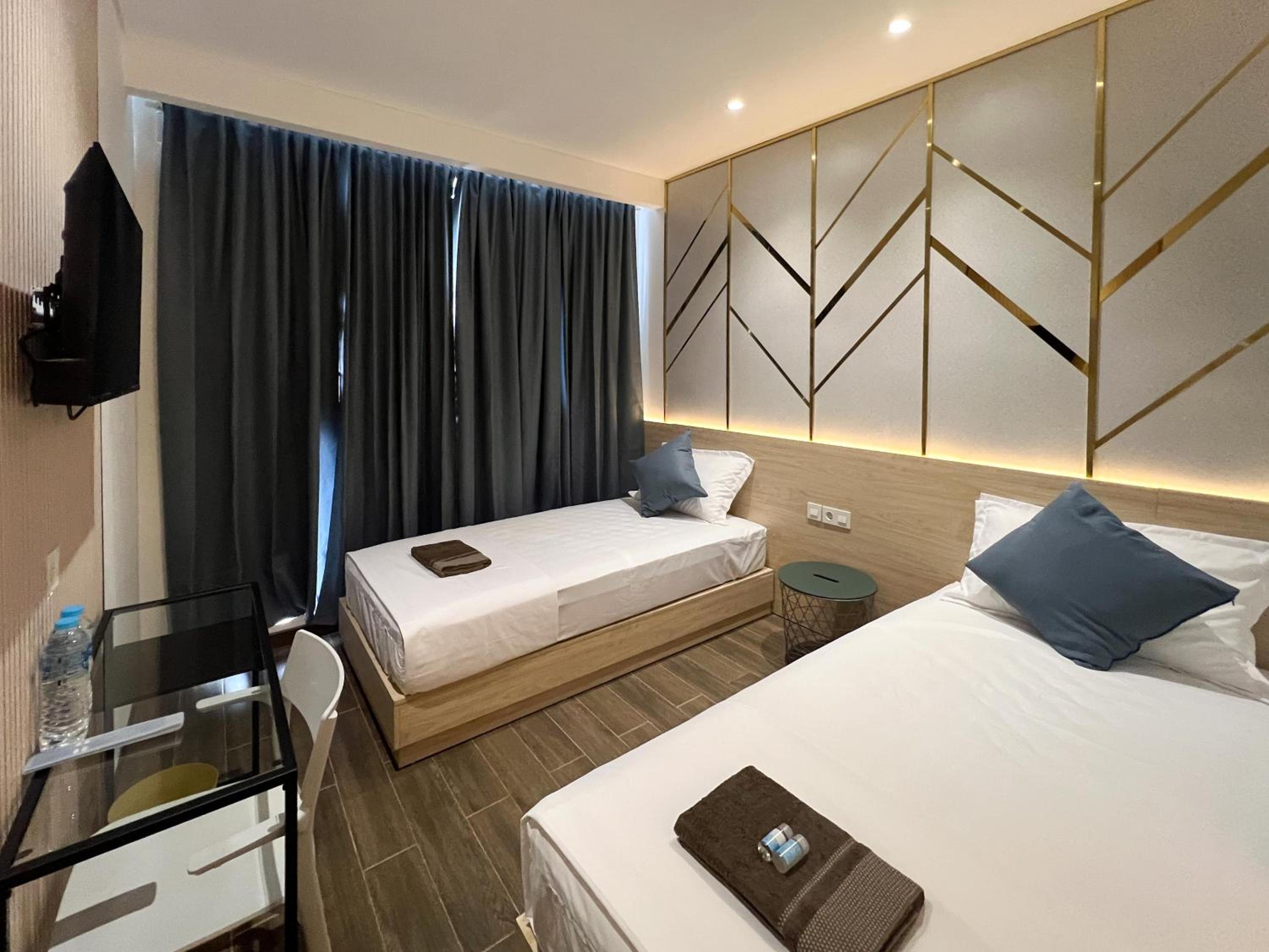 Deluxe Twin Room - Photo 9
