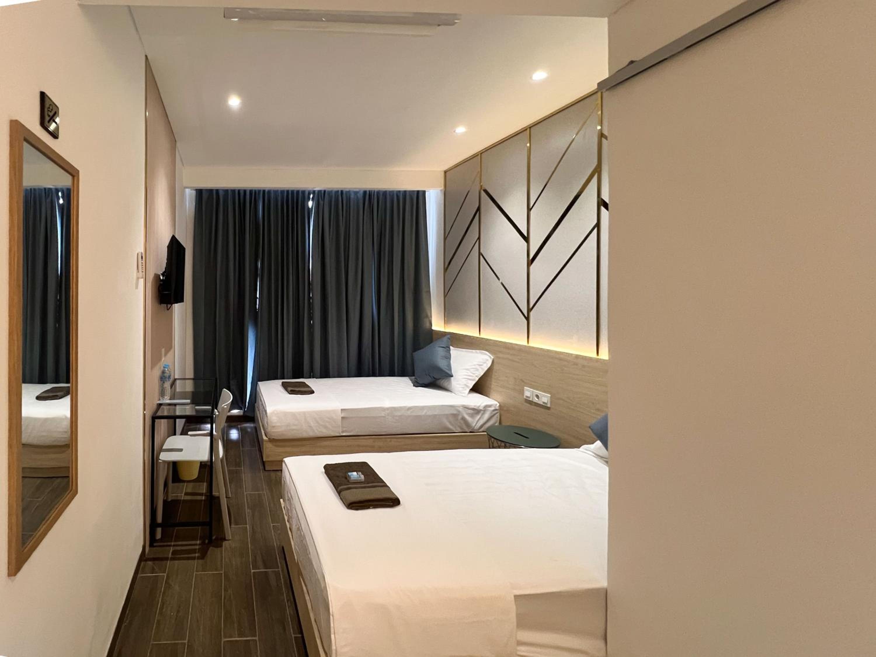 Deluxe Twin Room - Photo 8