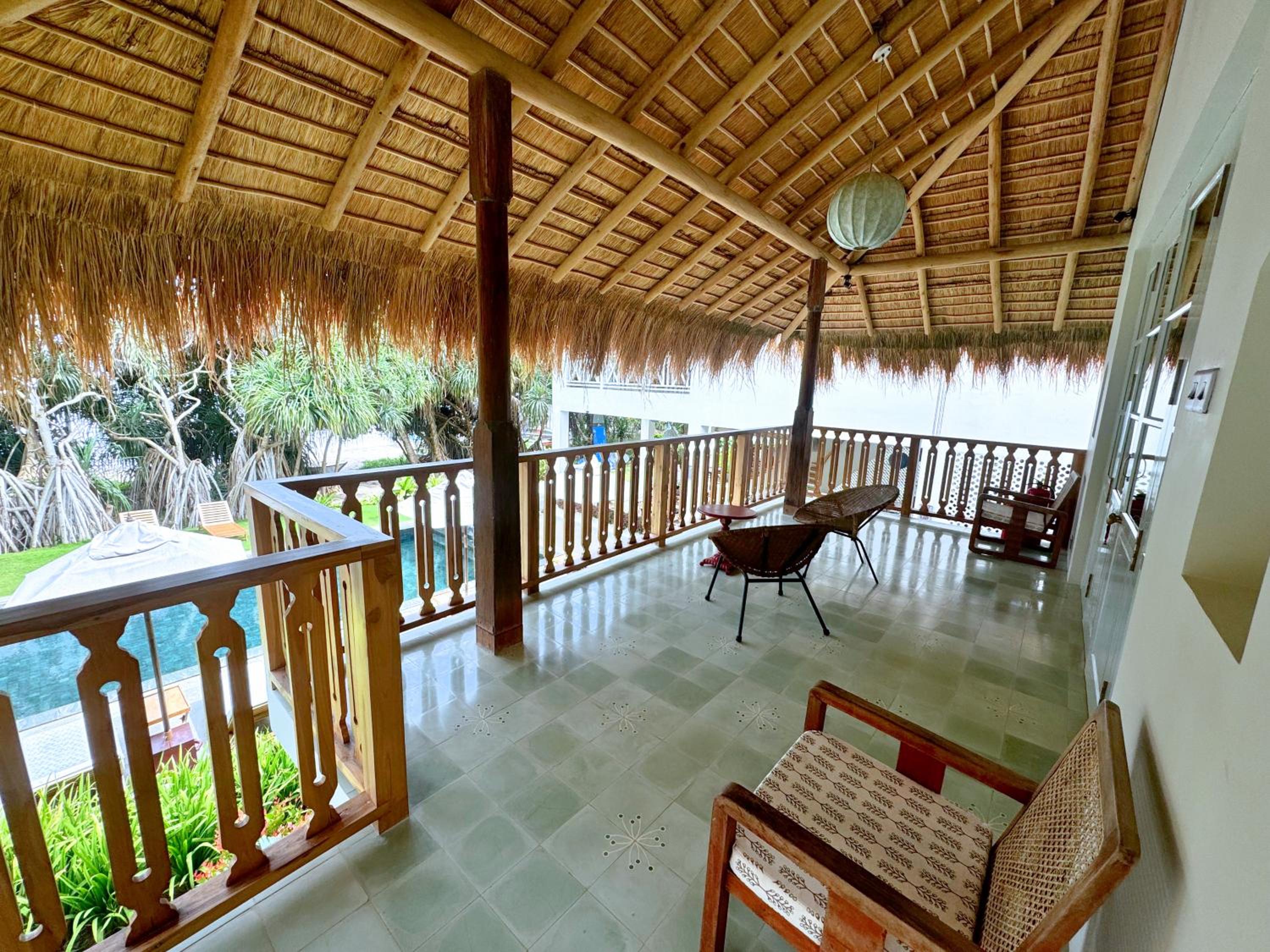 Deluxe Room with Balcony - Photo 2