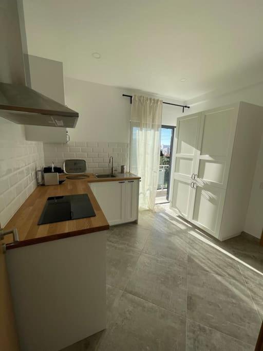 Three-Bedroom Apartment photo 2