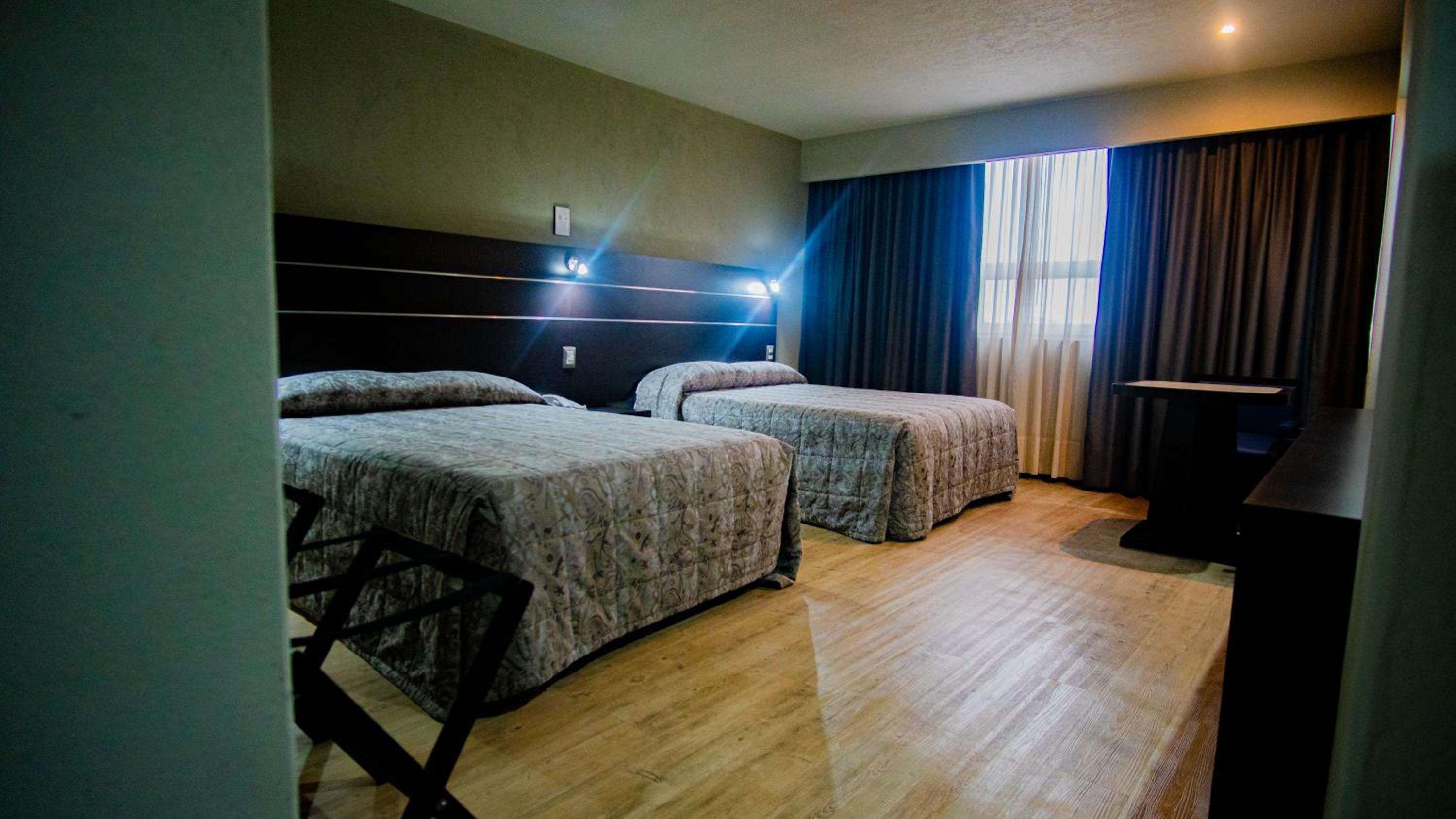 Doppelzimmer mit zwei Doppelbetten