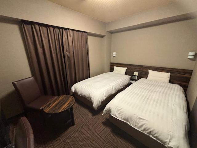 Twin Room - Non-Smoking photo 1