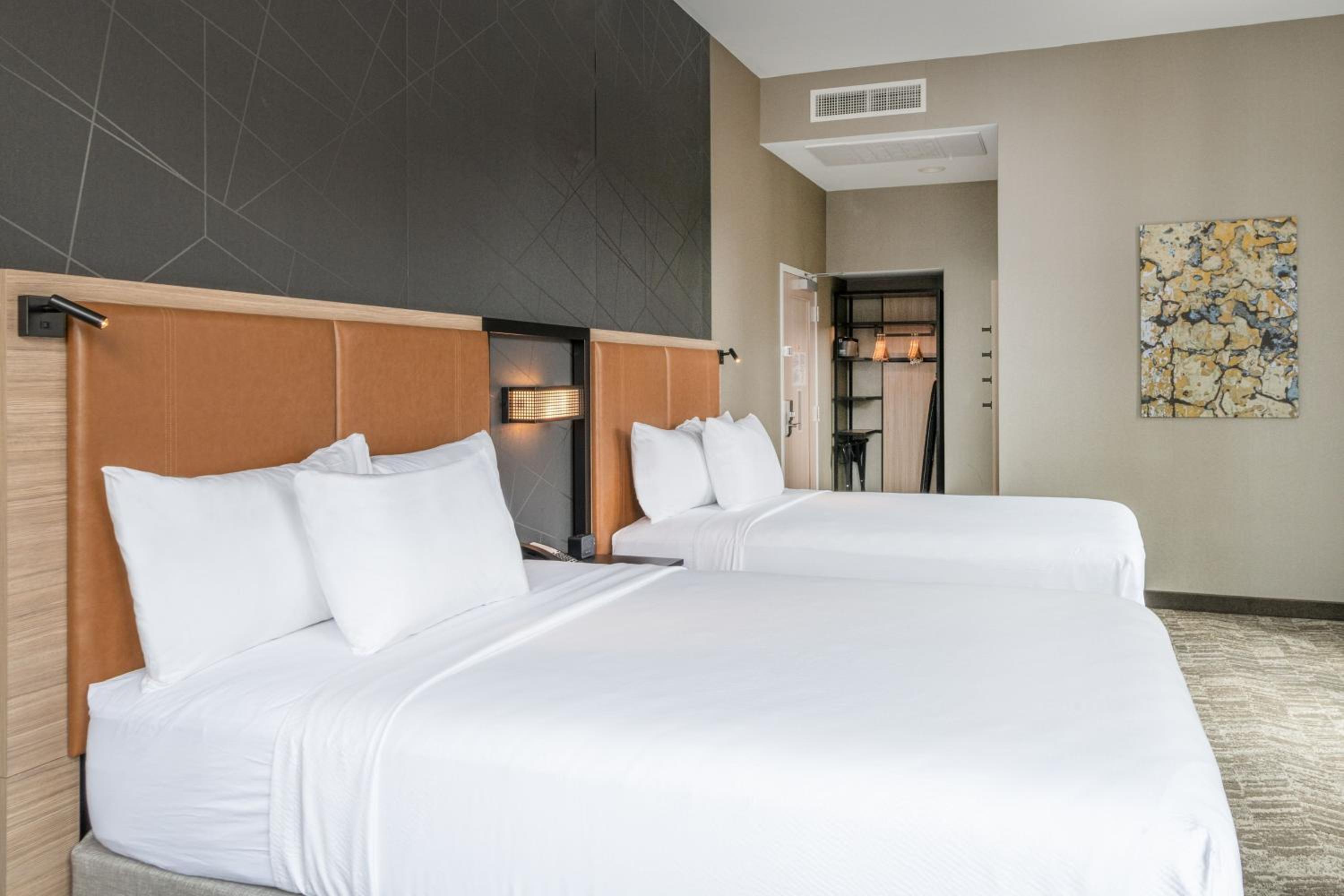 Queen Room with Two Queen Beds and City View - Photo 1