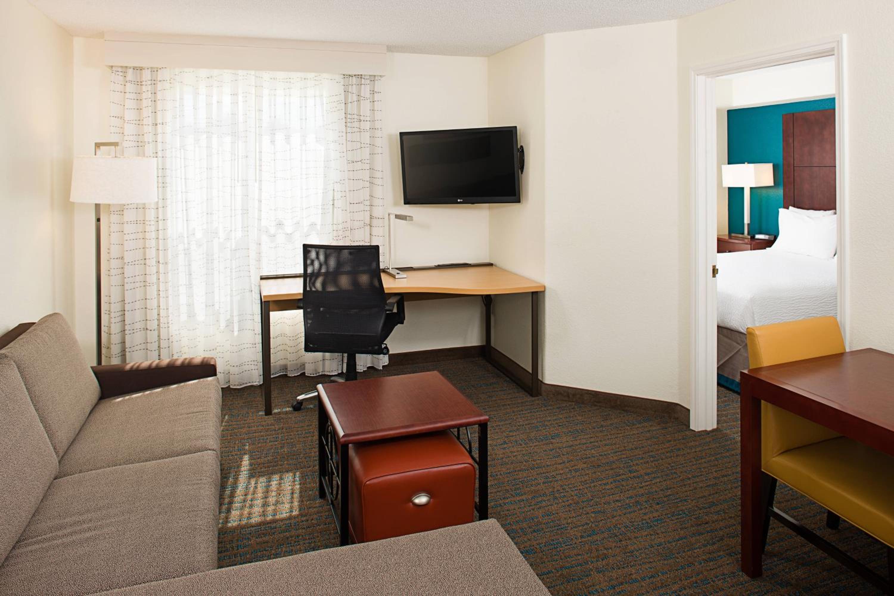One-Bedroom Queen Suite with Sofa Bed - Photo 1