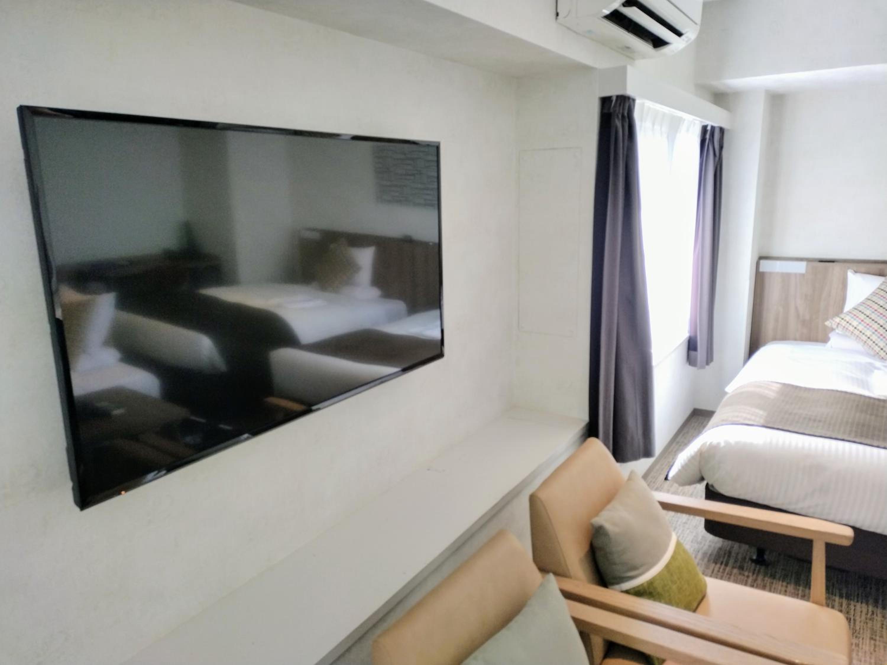 Deluxe Family Room with Kitchen - Non-Smoking - House Keeping is Optional with Additional Cost photo 3