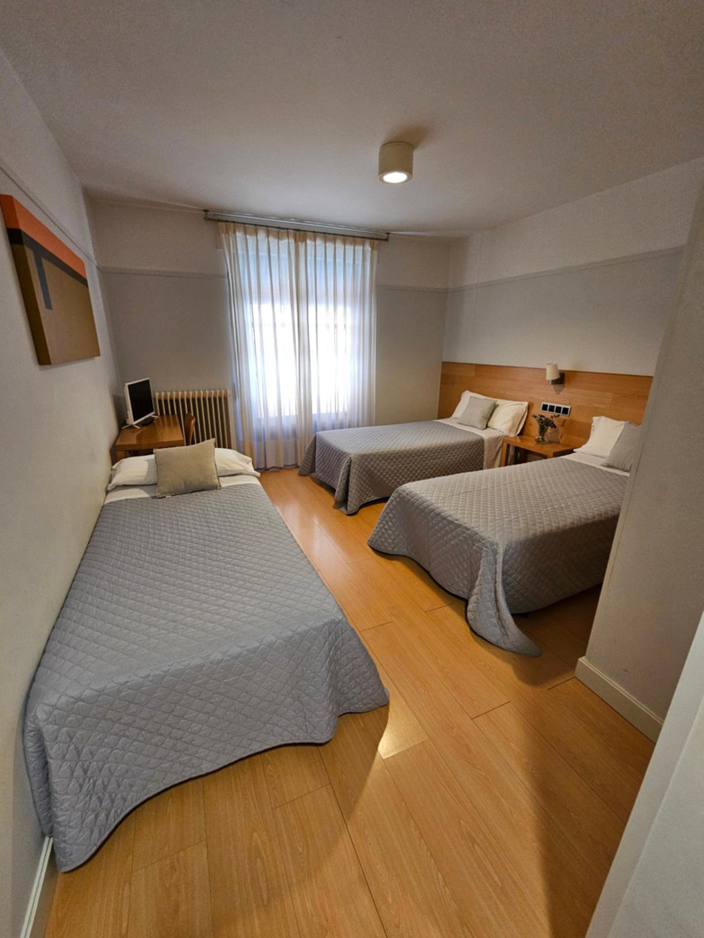 Habitación Triple con Balcón