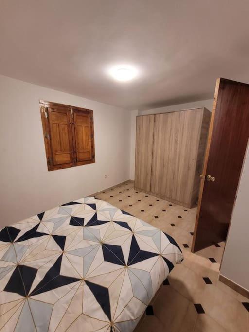 Casa de cuatro habitaciones