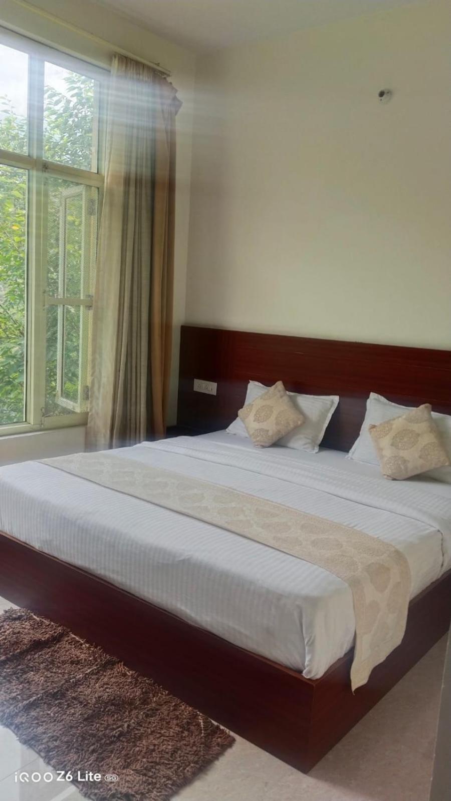 Deluxe Room - Photo 1