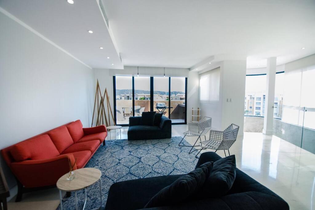 Three-Bedroom Apartment photo 1