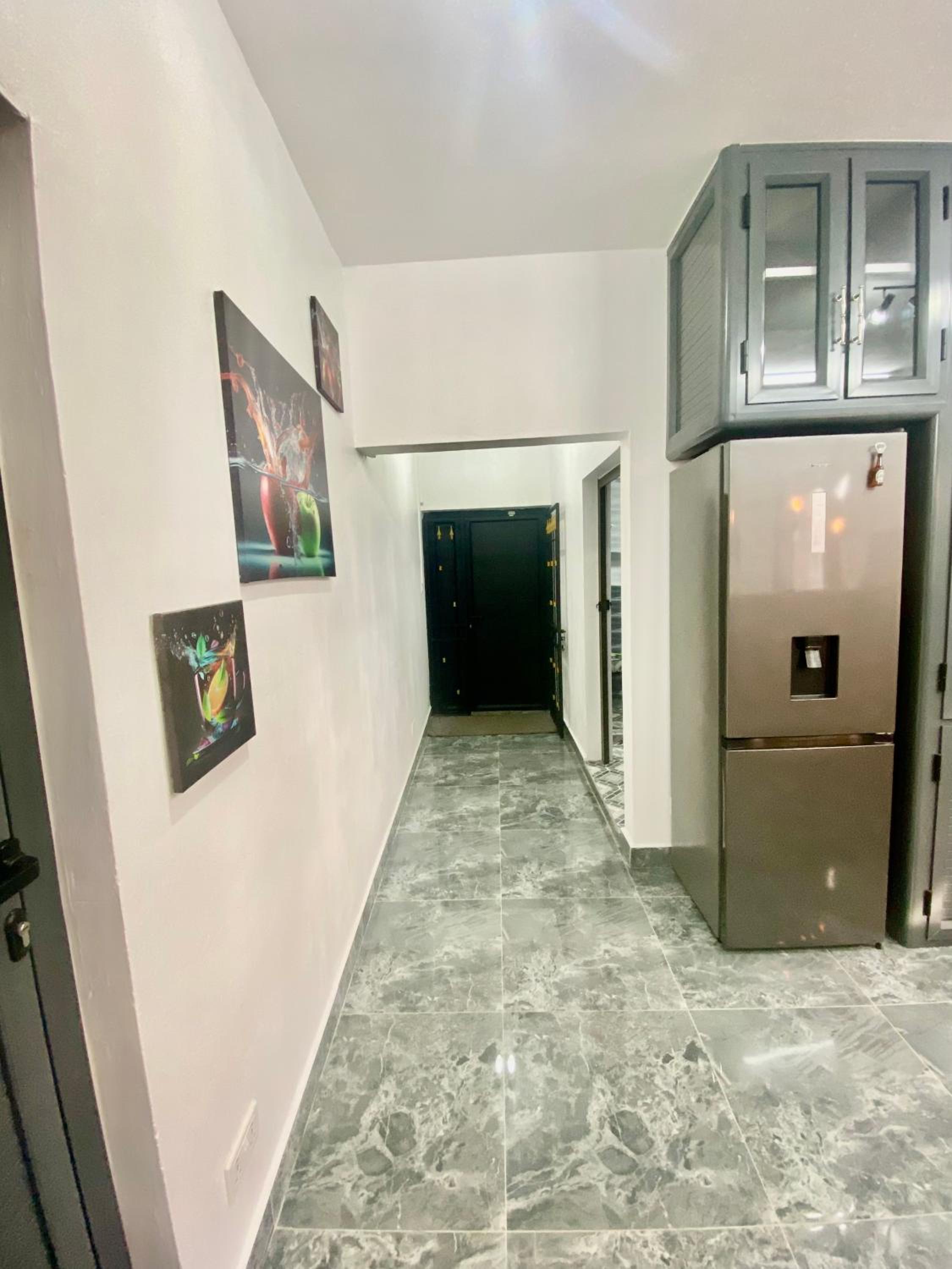 Three-Bedroom Apartment photo 2
