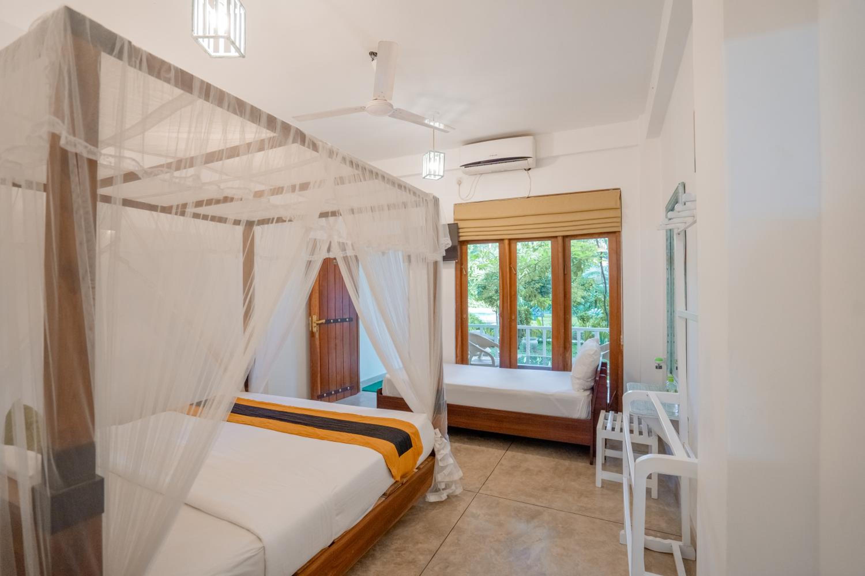 Deluxe Dreibettzimmer