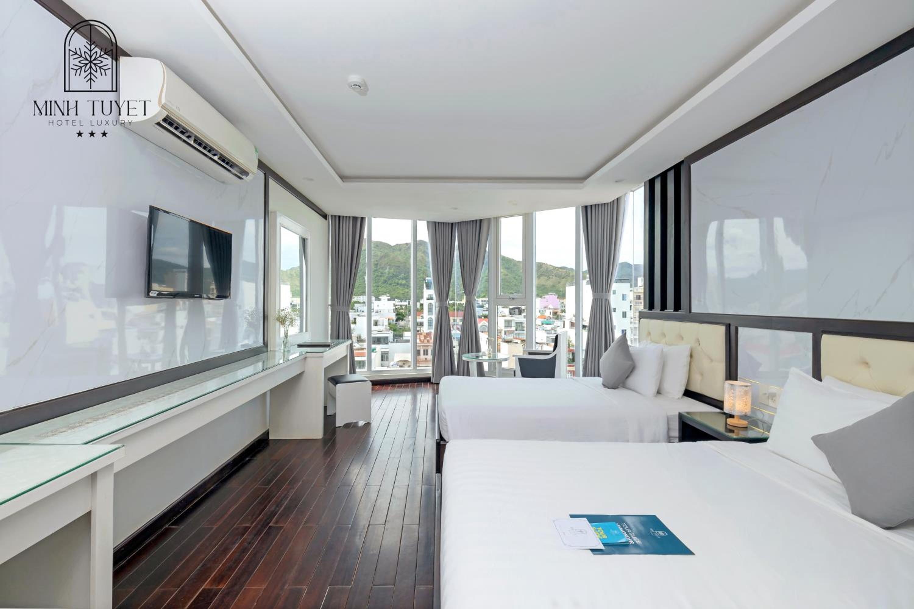 Deluxe Triple Room - Photo 1