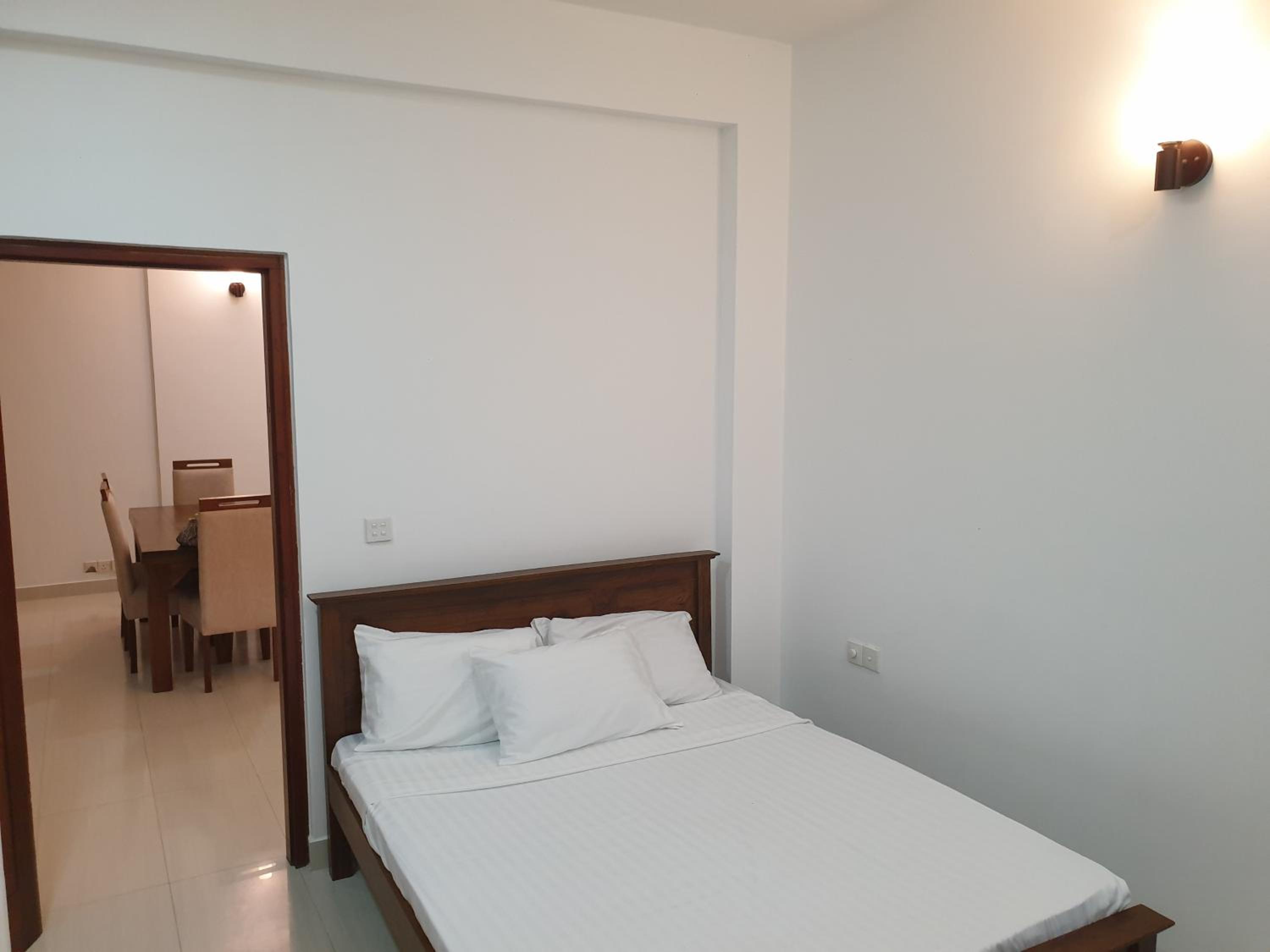 Three-Bedroom Apartment photo 2