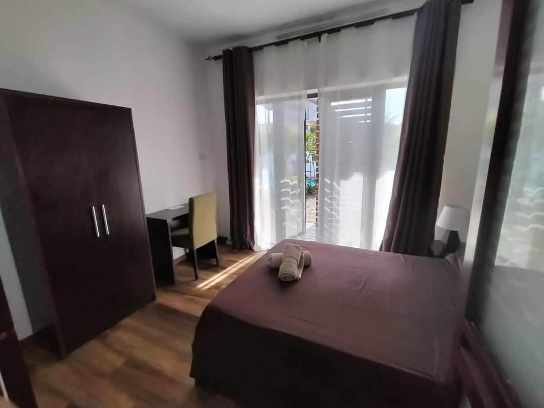 Three-Bedroom Apartment - Photo 13