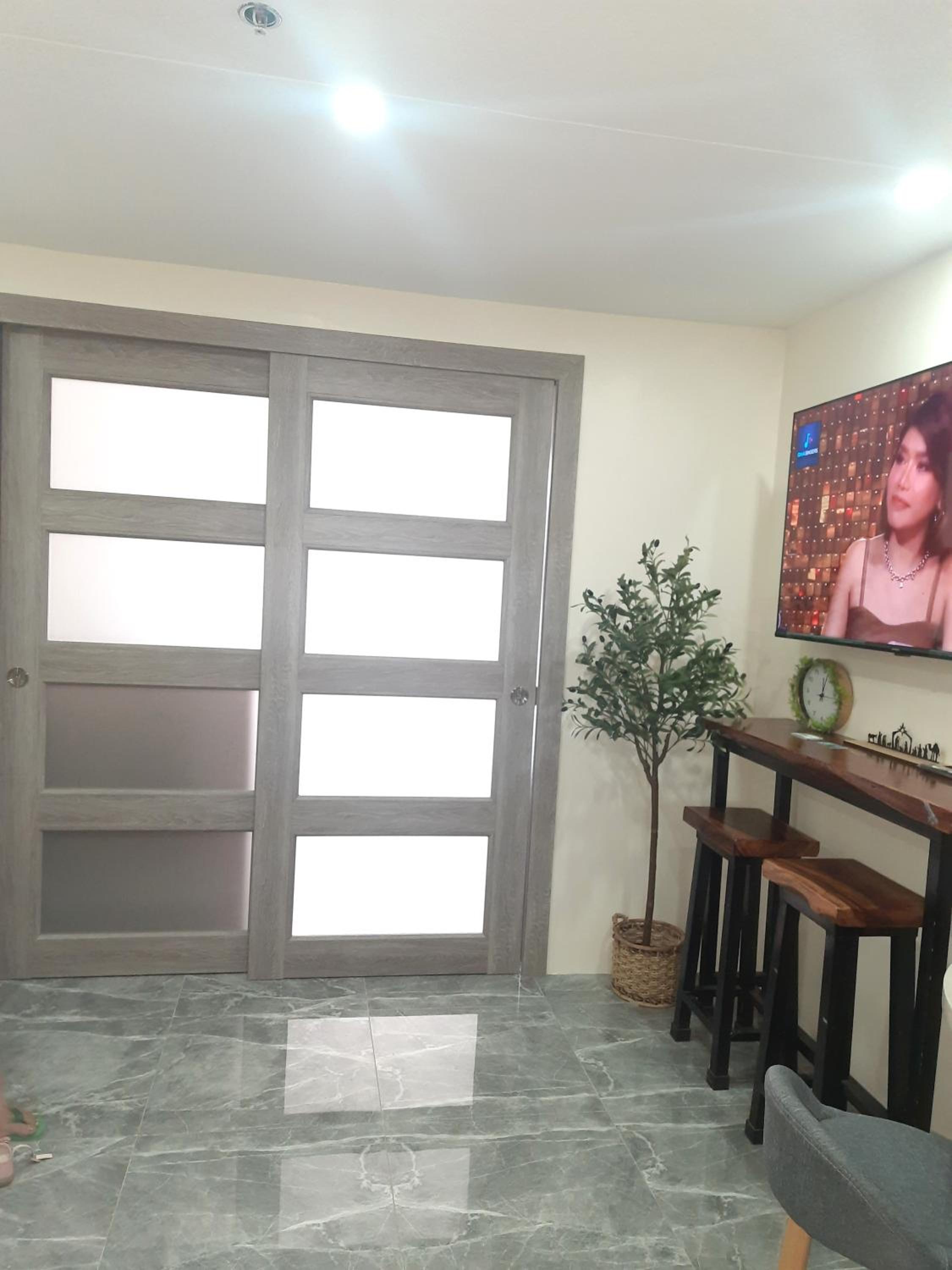 One-Bedroom Apartment with Balcony and City View