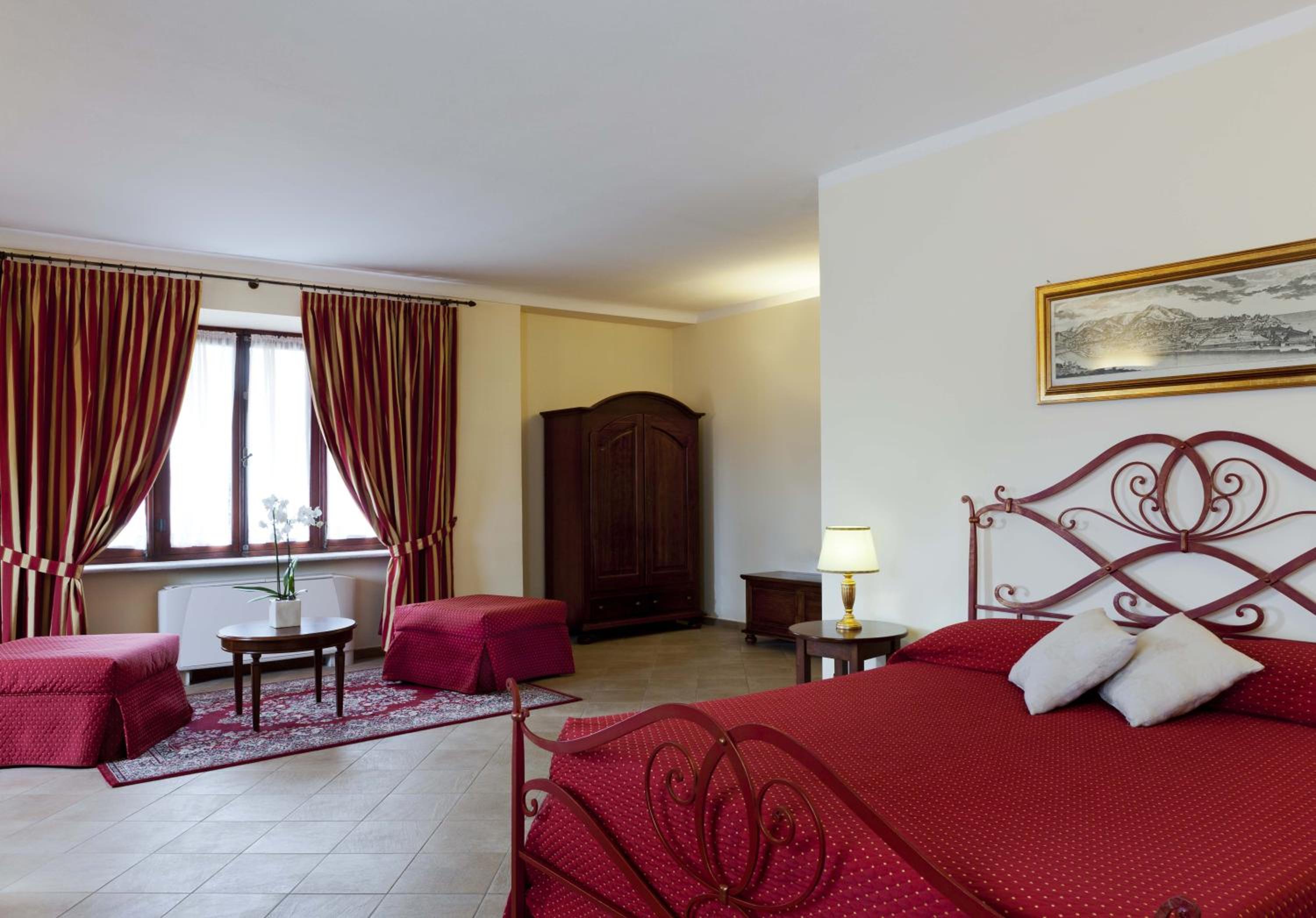 King Suite with Balcony - Photo 1