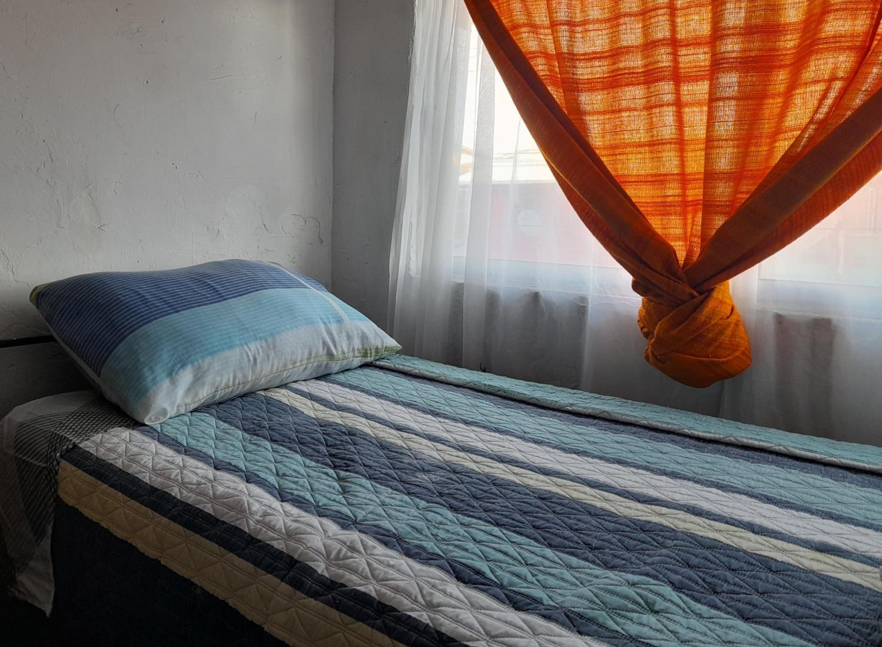 Single Bed In Female Dormitory Room photo 1