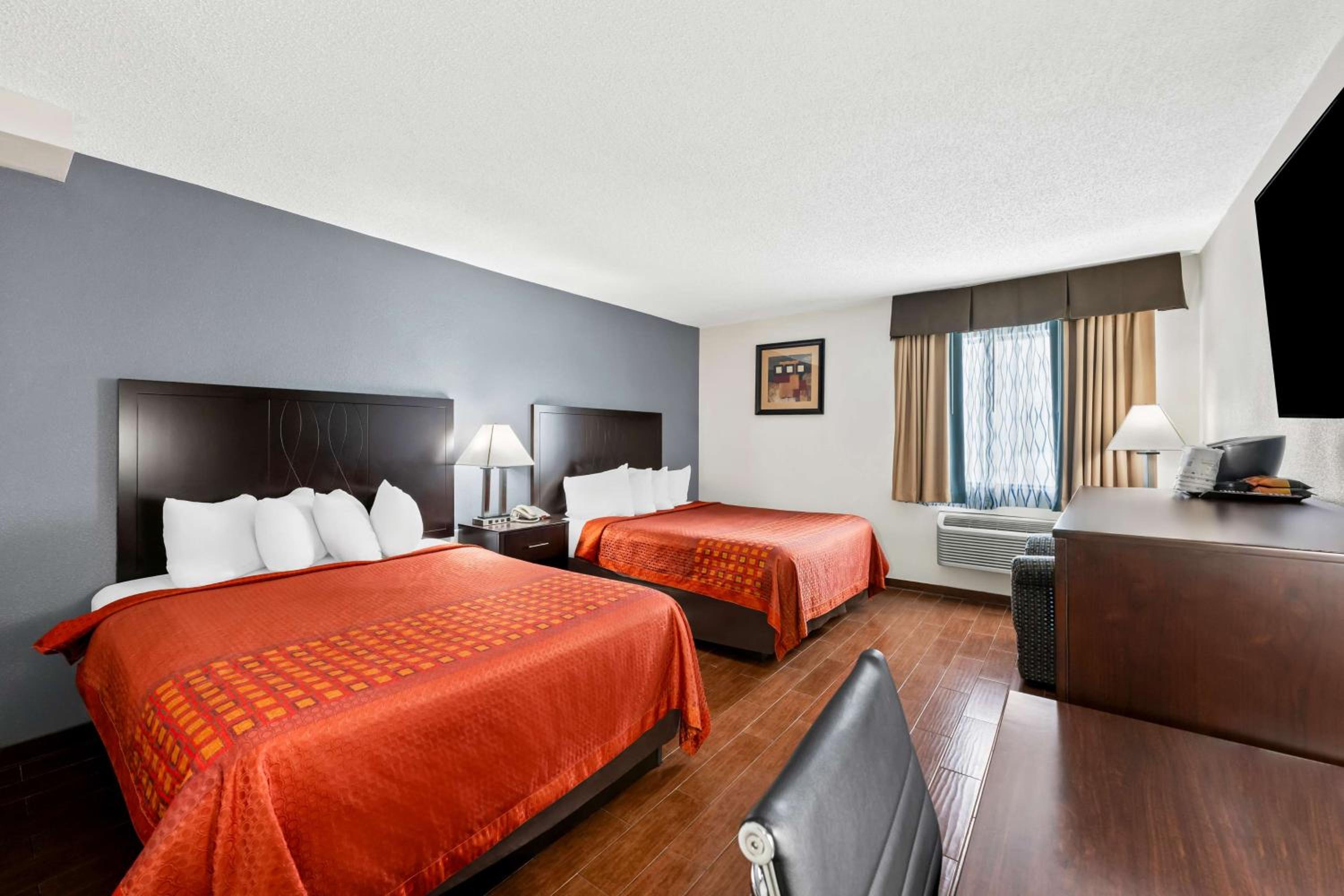 Queen Room with Two Queen Beds - Photo 1