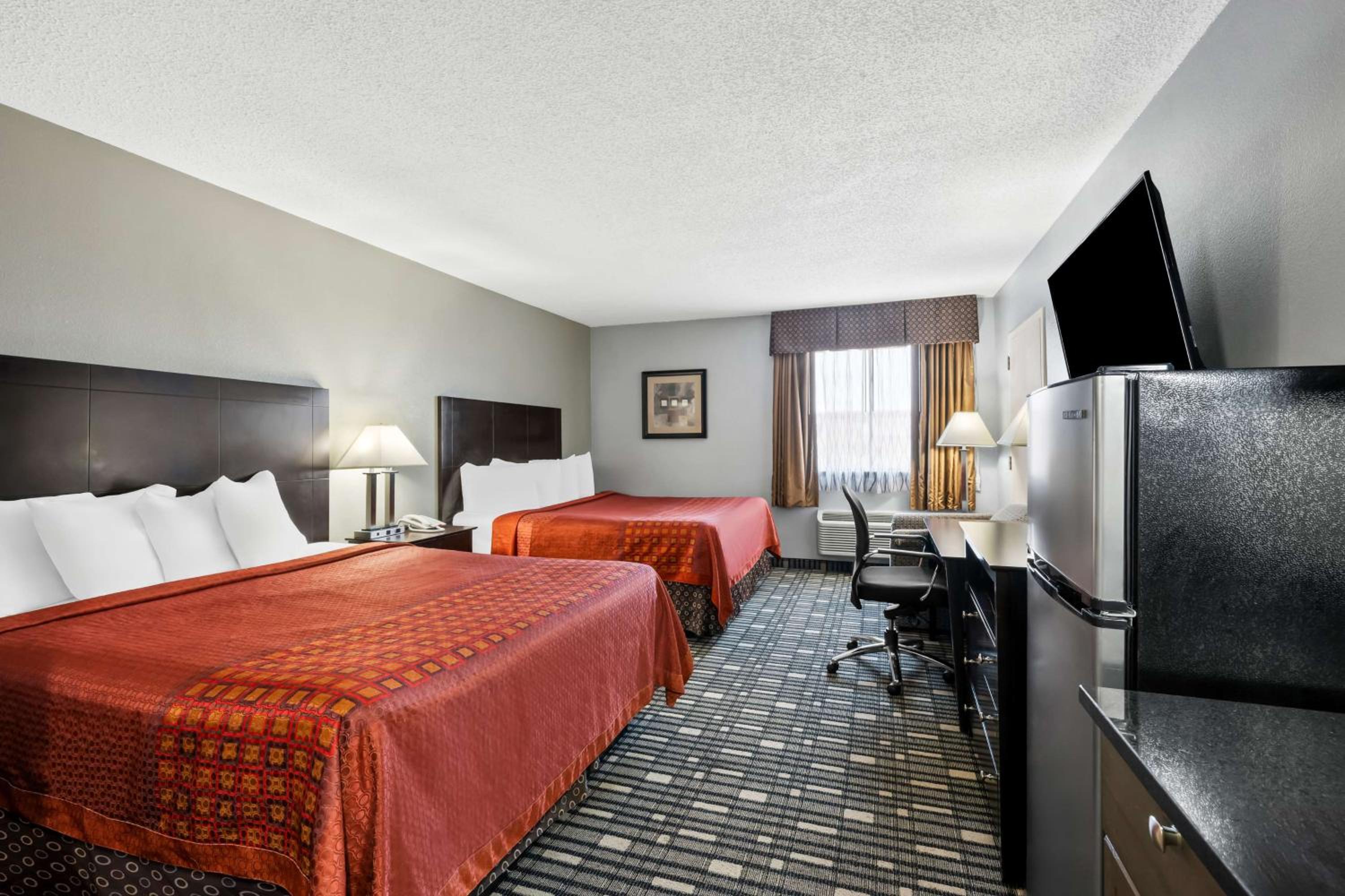 Queen Room with Two Queen Beds and Kitchenette - Photo 1