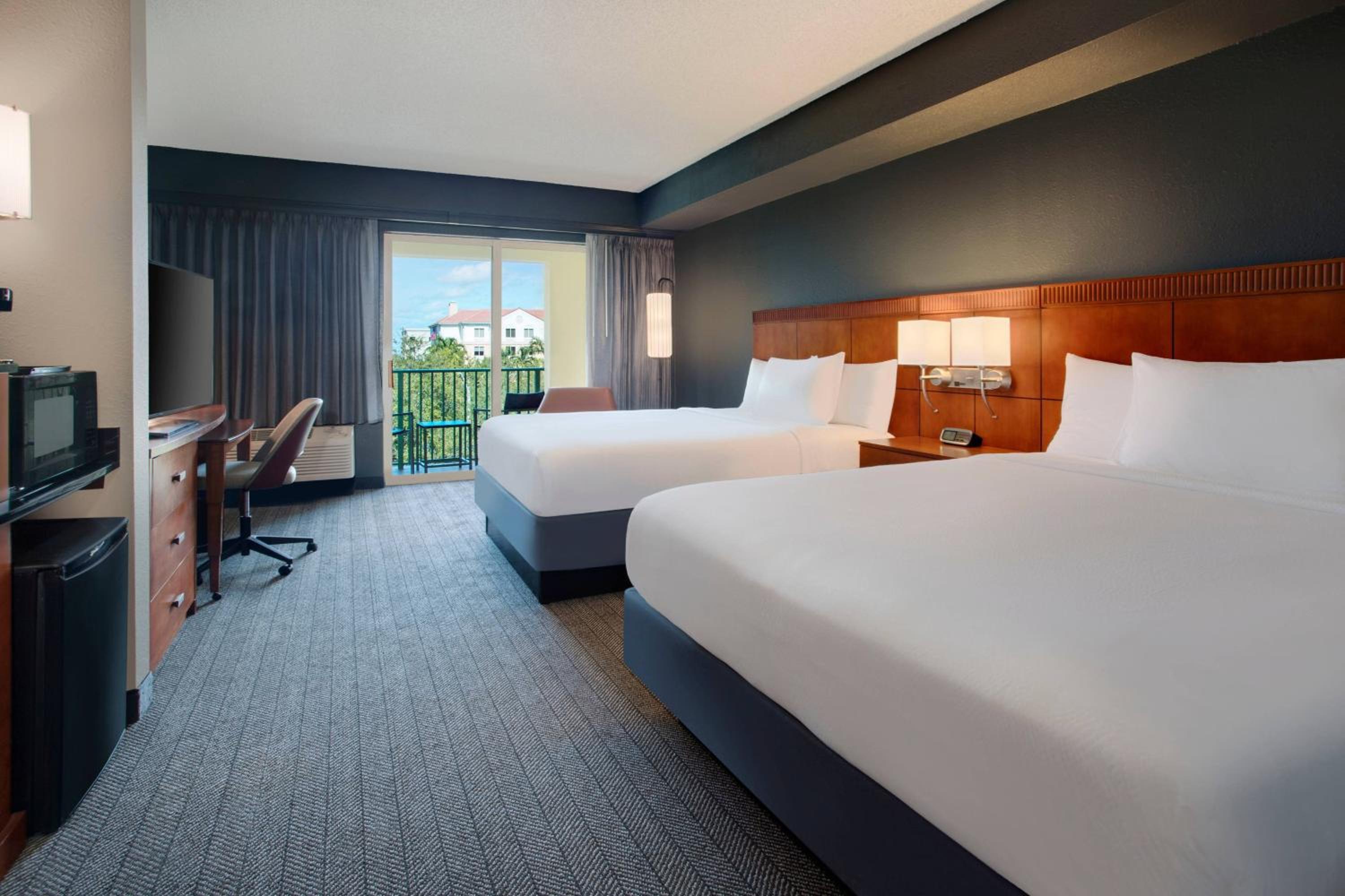 Queen Room with Two Queen Beds with Balcony - Photo 1