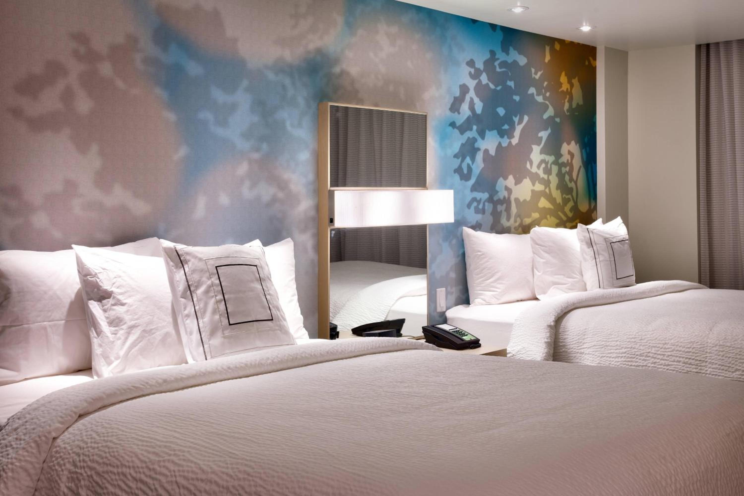 Queen Suite with Two Queen Beds and Sofa Bed photo 3