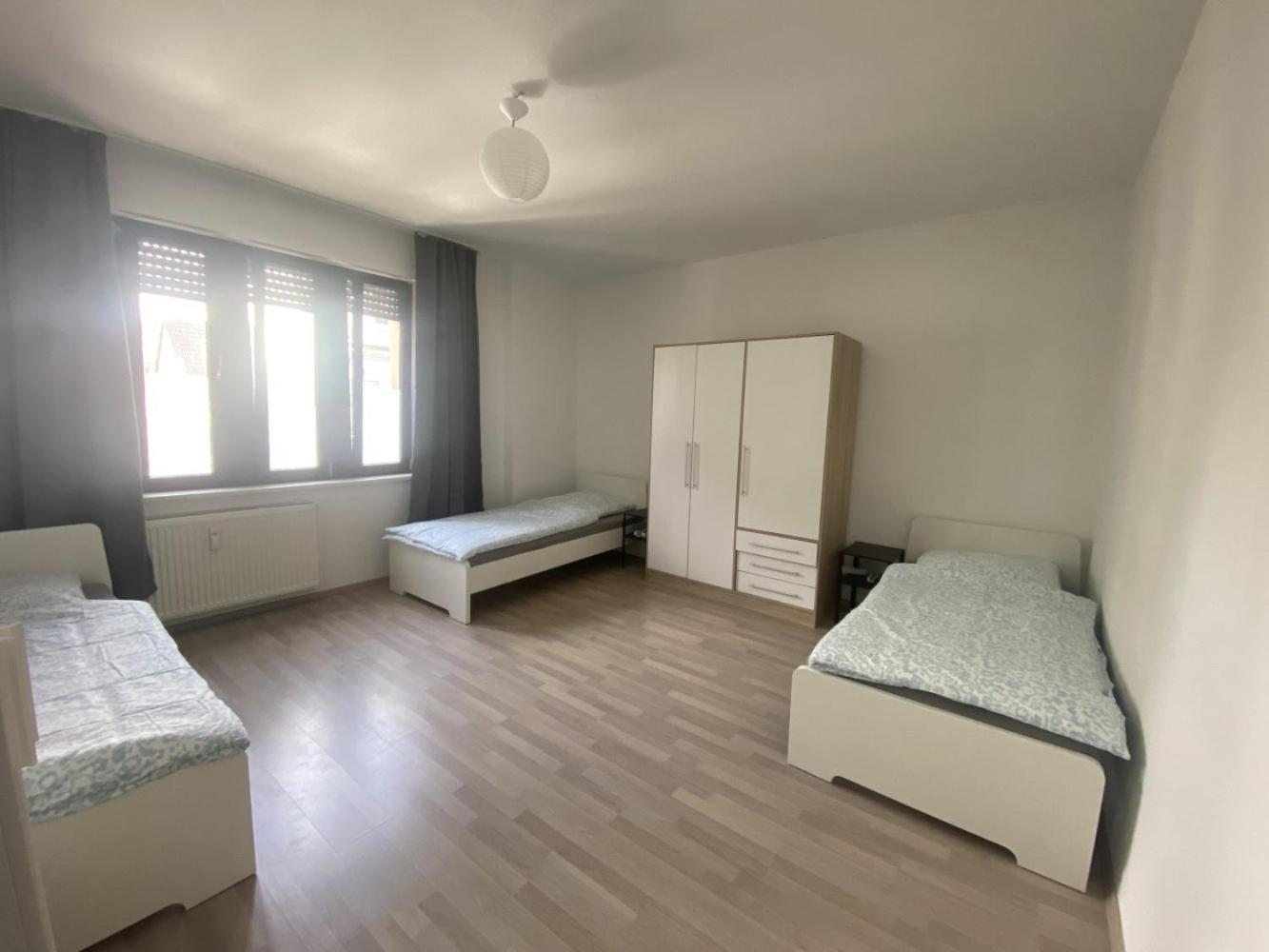 Three-Bedroom Apartment photo 1