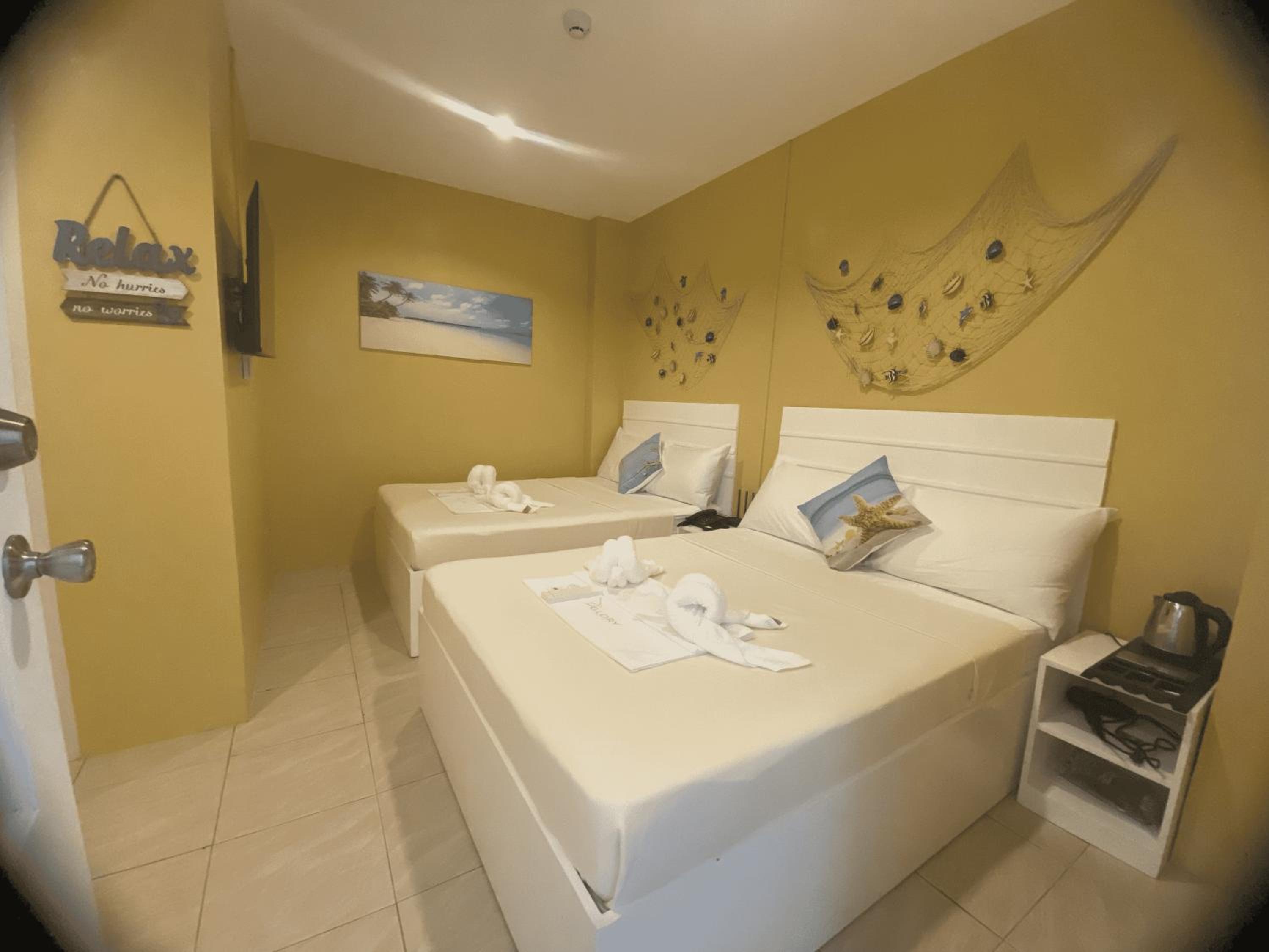 Quadruple Room - Photo 1
