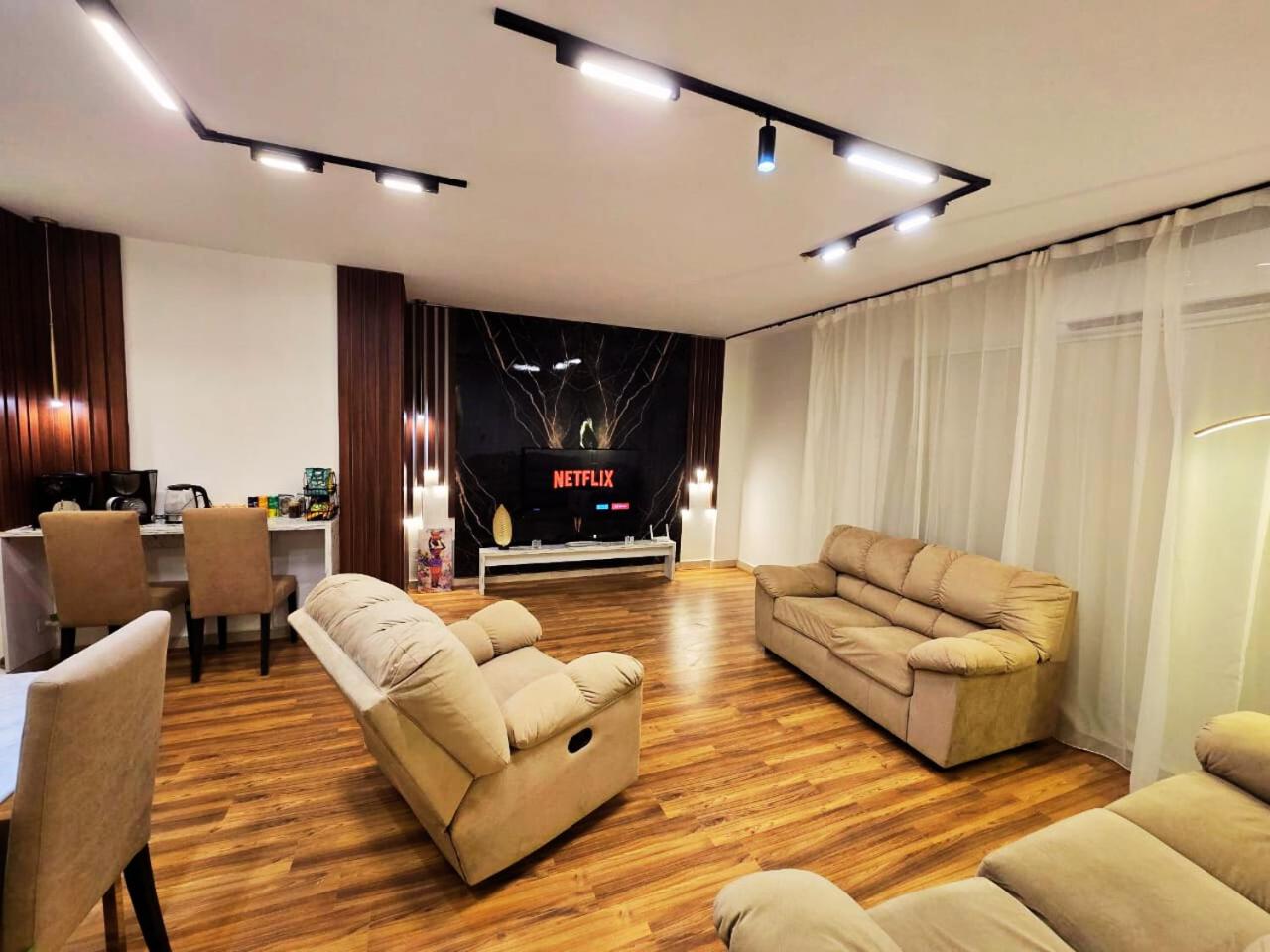 Three-Bedroom Apartment photo 1