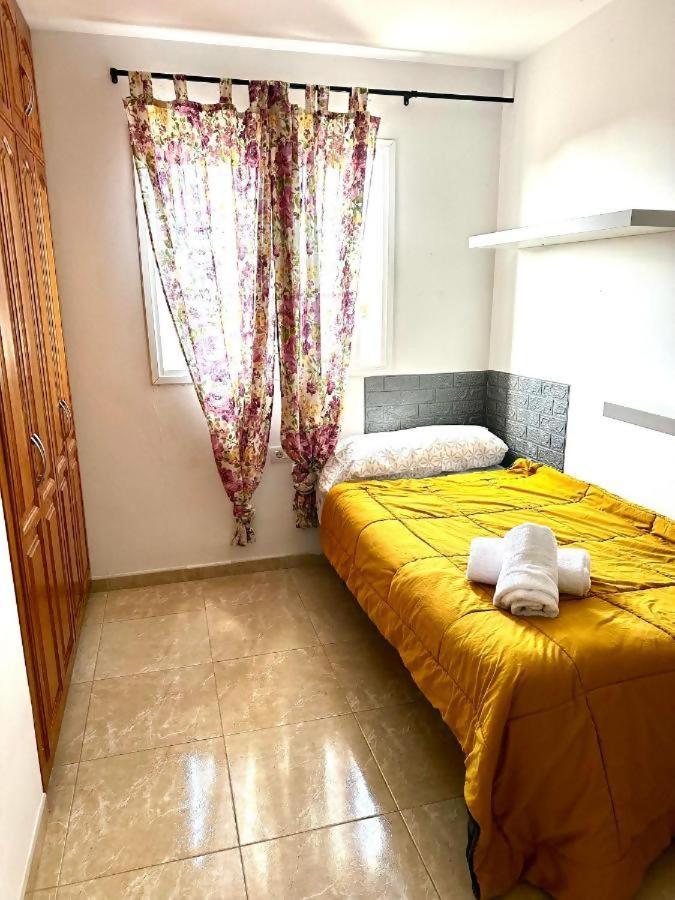 Habitación individual con baño compartido