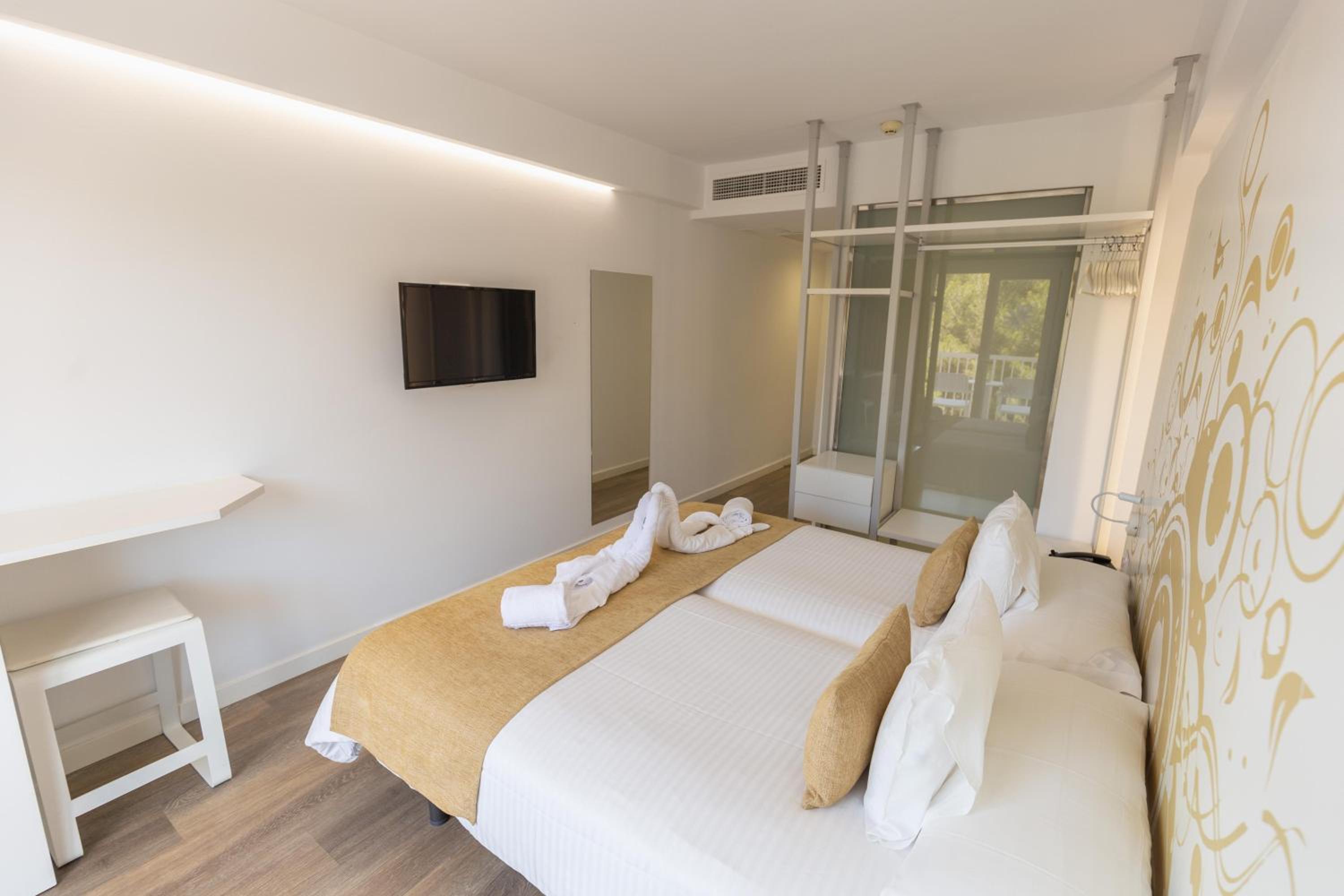 Habitación Doble Estándar o con Dos Camas Individuales.
