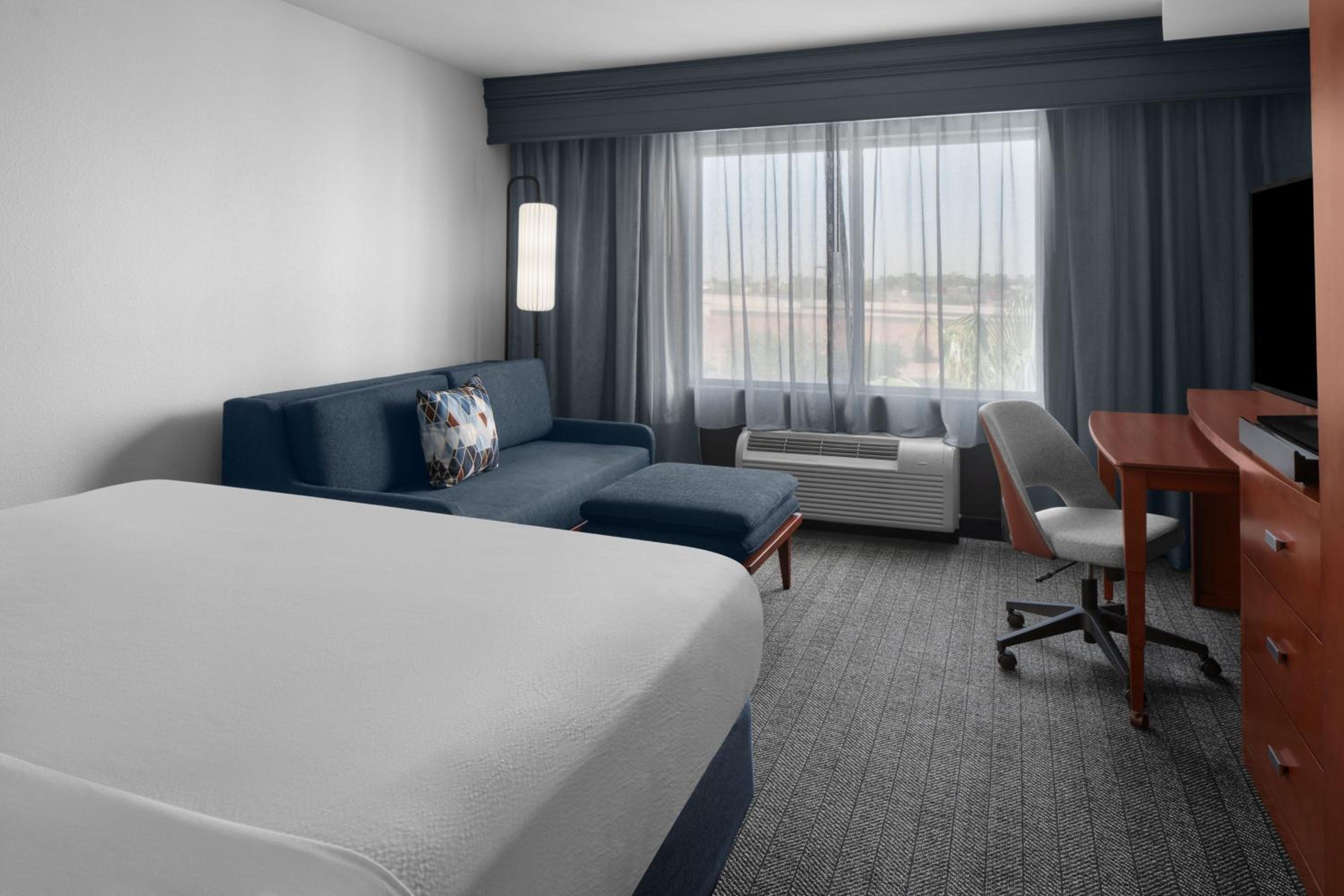 King Room with Sofa Bed and Roll-in Shower - Mobility and Hearing Accessible - Photo 5