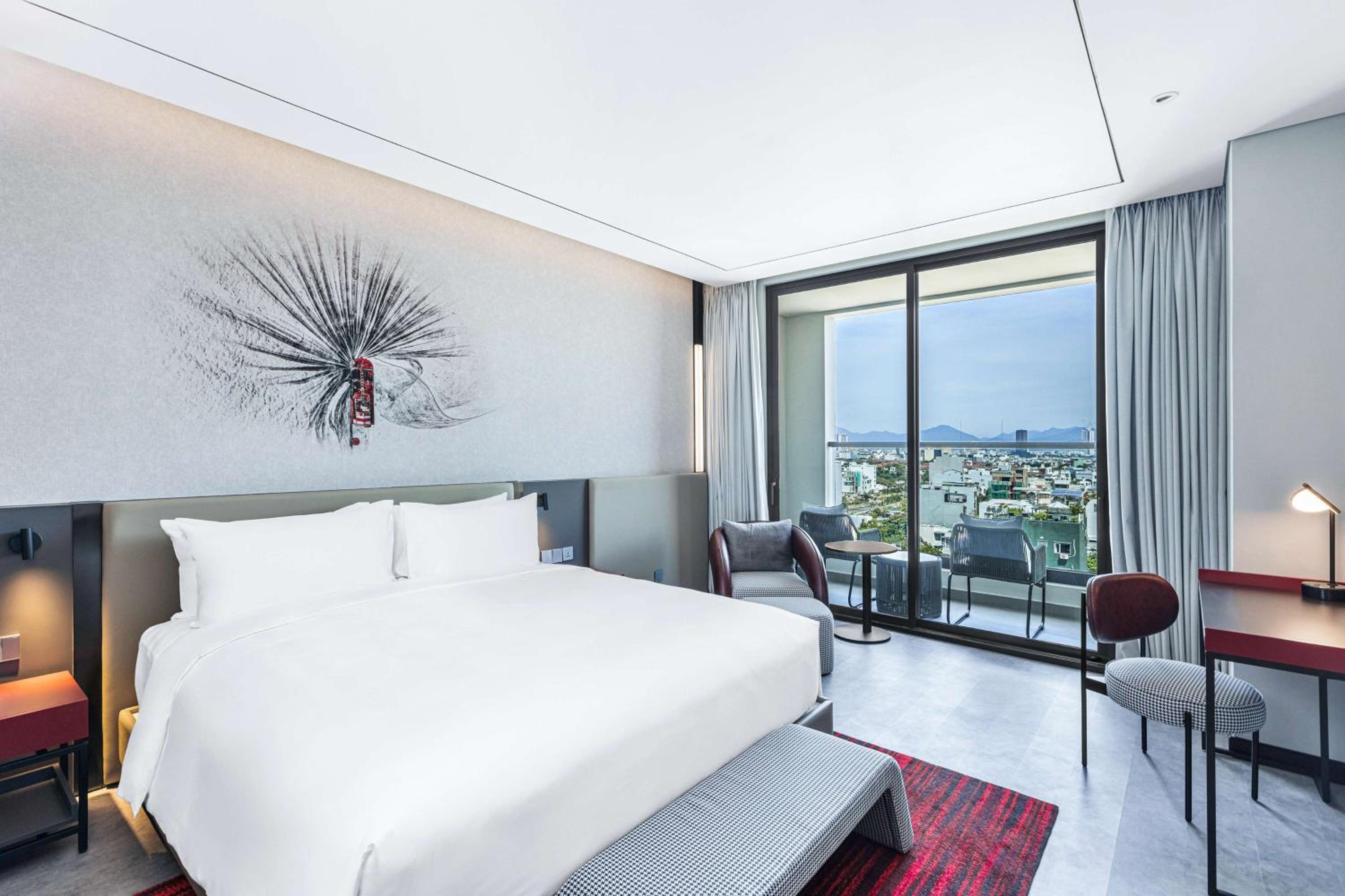 Deluxe Room with Balcony - City View - Photo 1