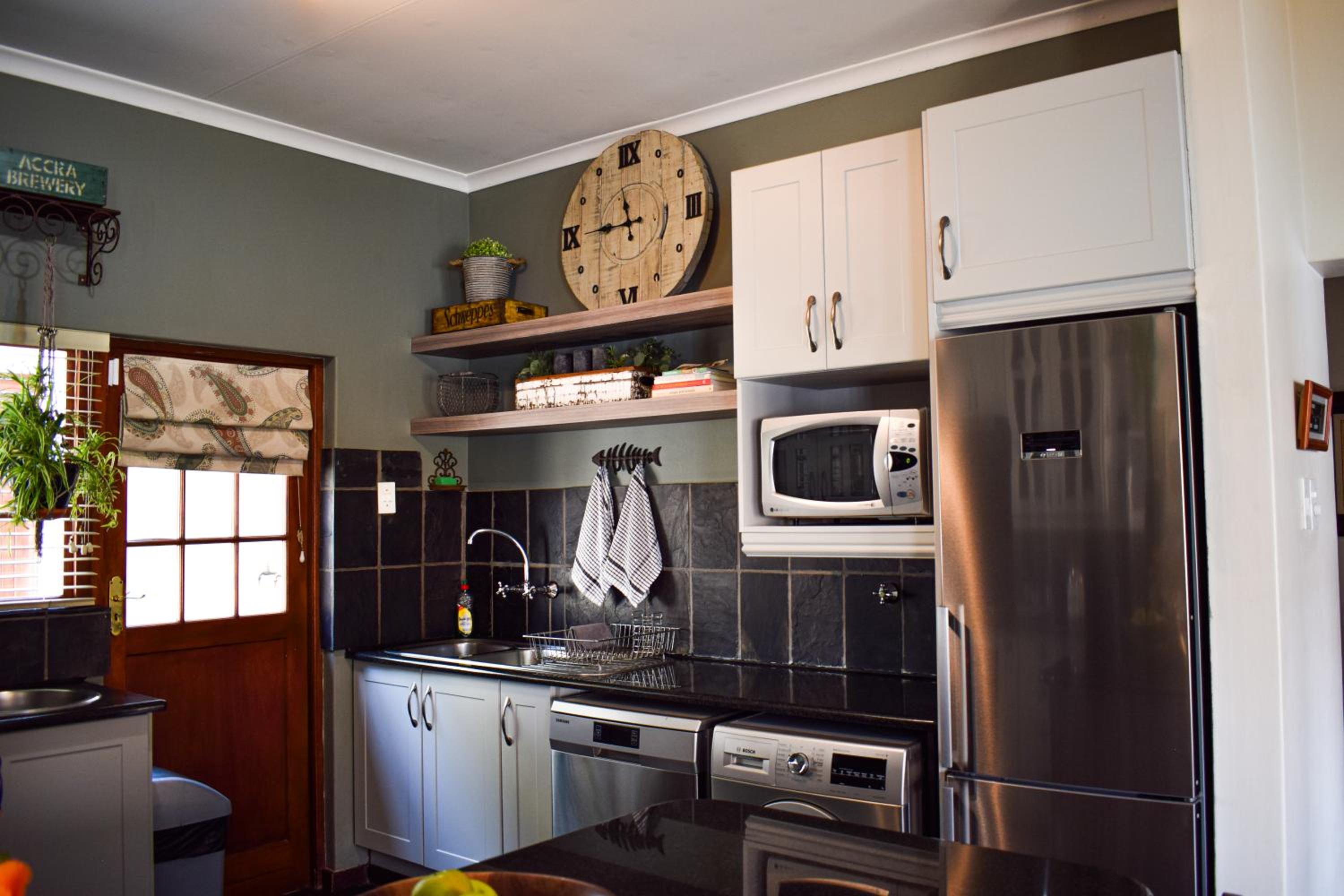 Four-Bedroom House - Photo 47