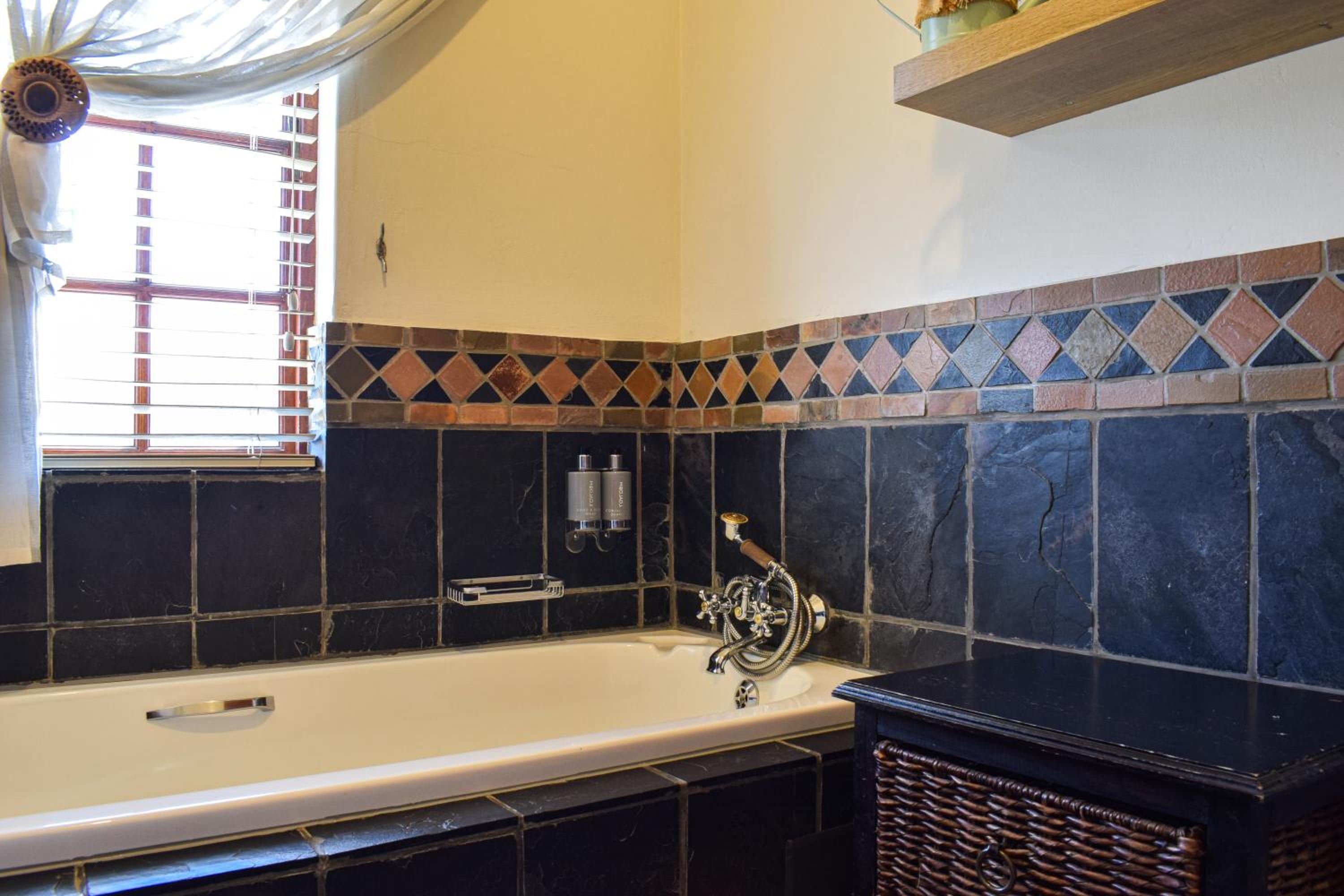 Four-Bedroom House - Photo 25