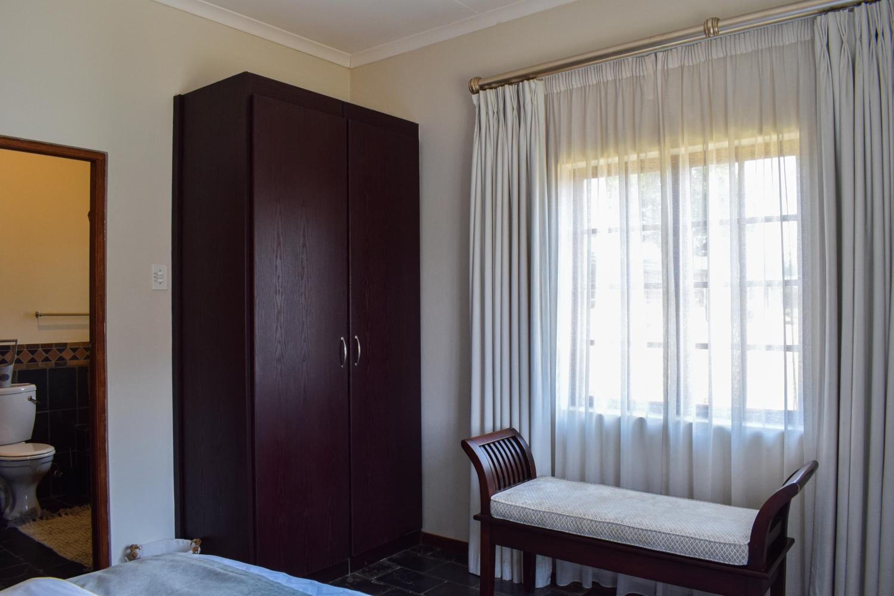 Four-Bedroom House - Photo 29