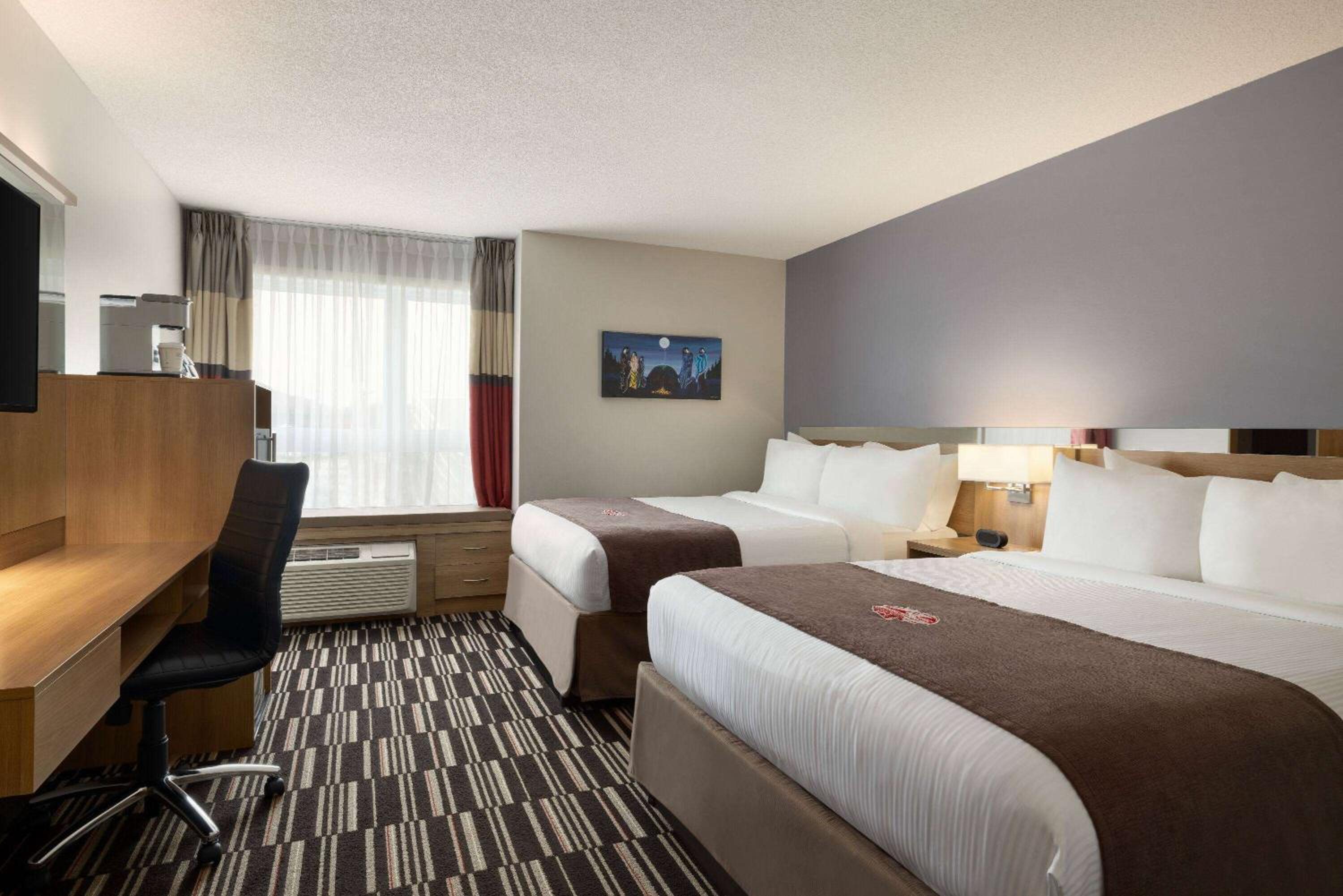 Queen Room with Two Queen Beds and Shower - Non-Smoking photo 1