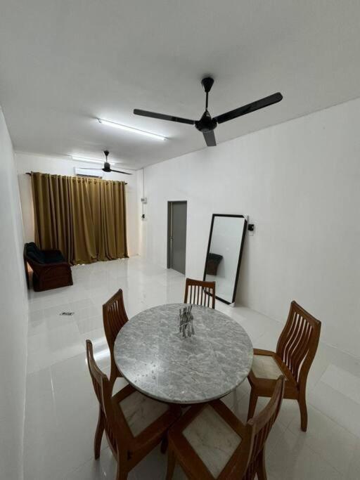 Three-Bedroom House photo 1