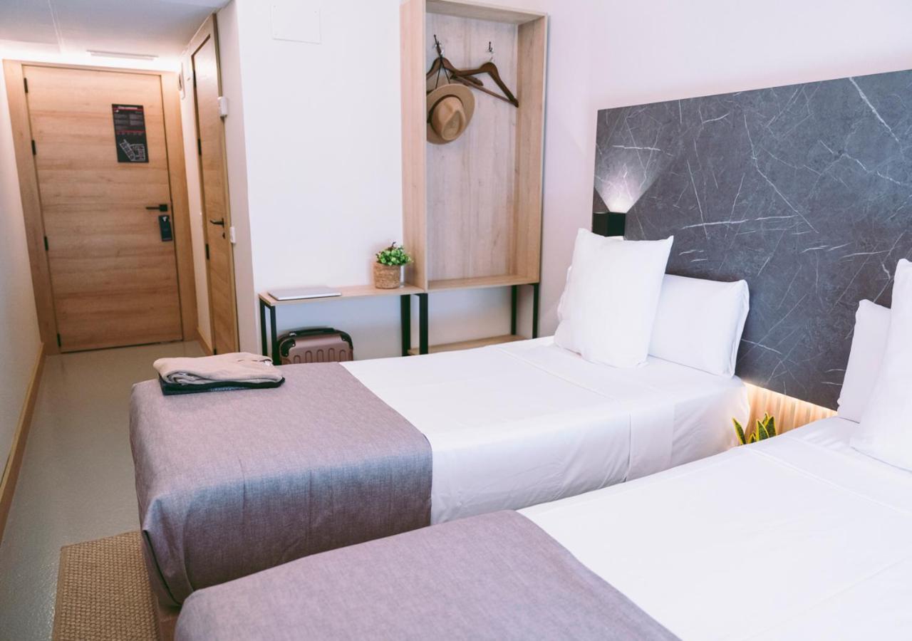 Habitación Doble Estándar o con Dos Camas Individuales.
