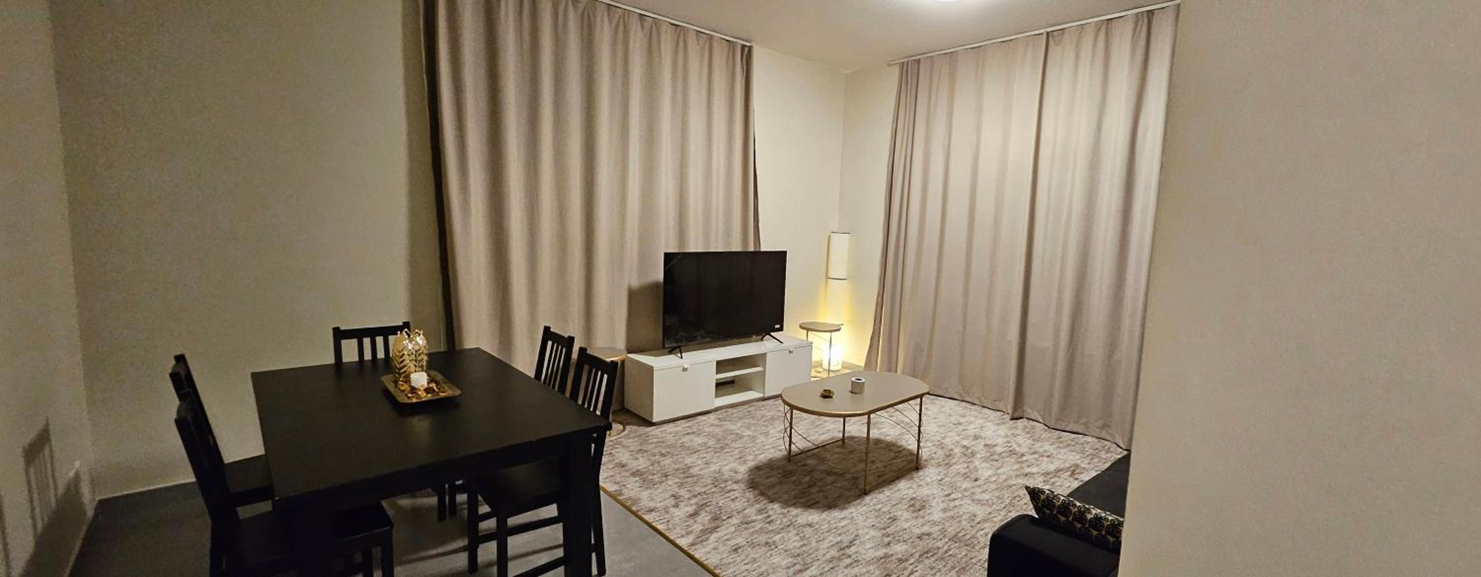 Three-Bedroom Apartment photo 1