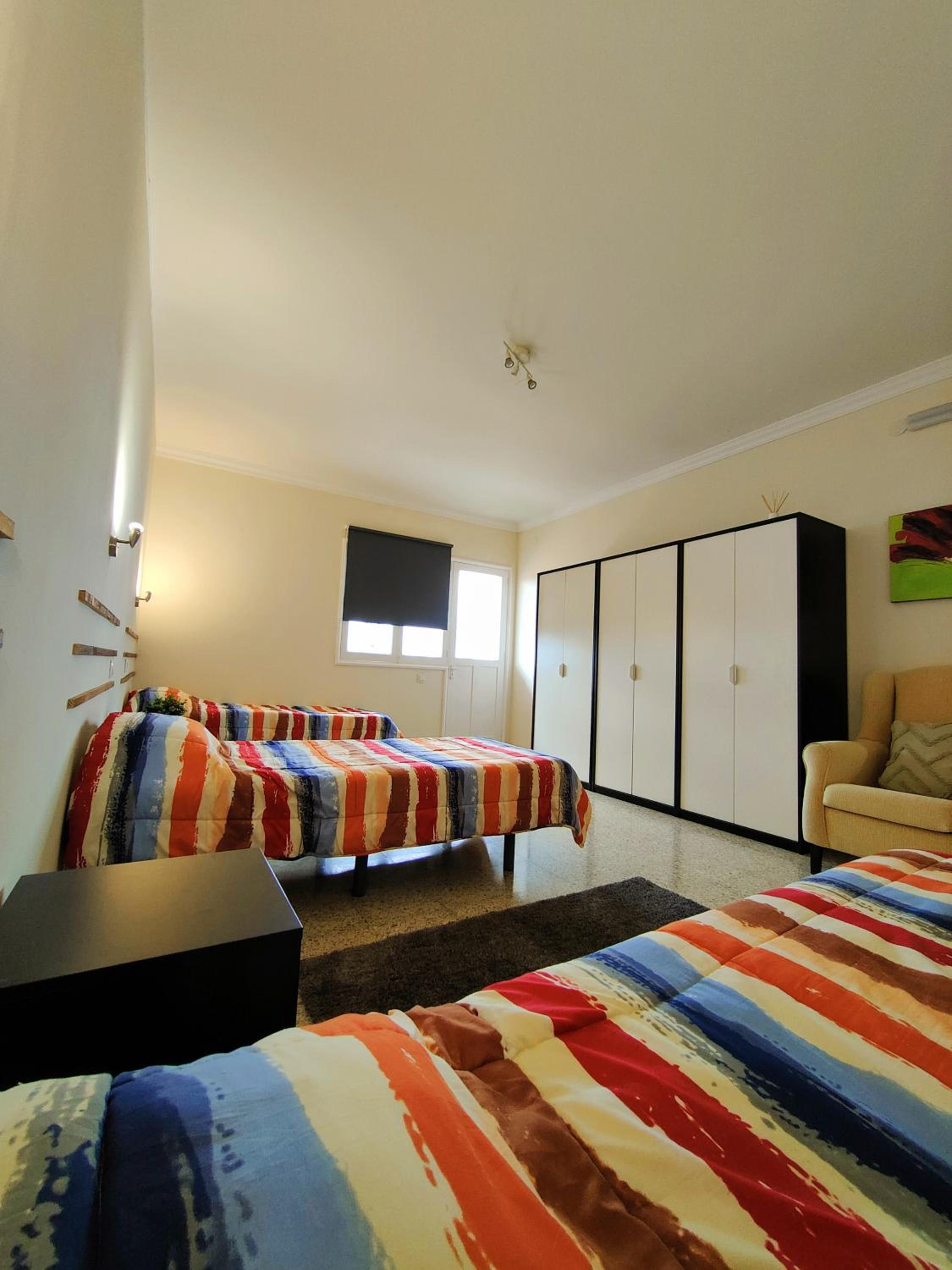 Habitación Triple con Balcón