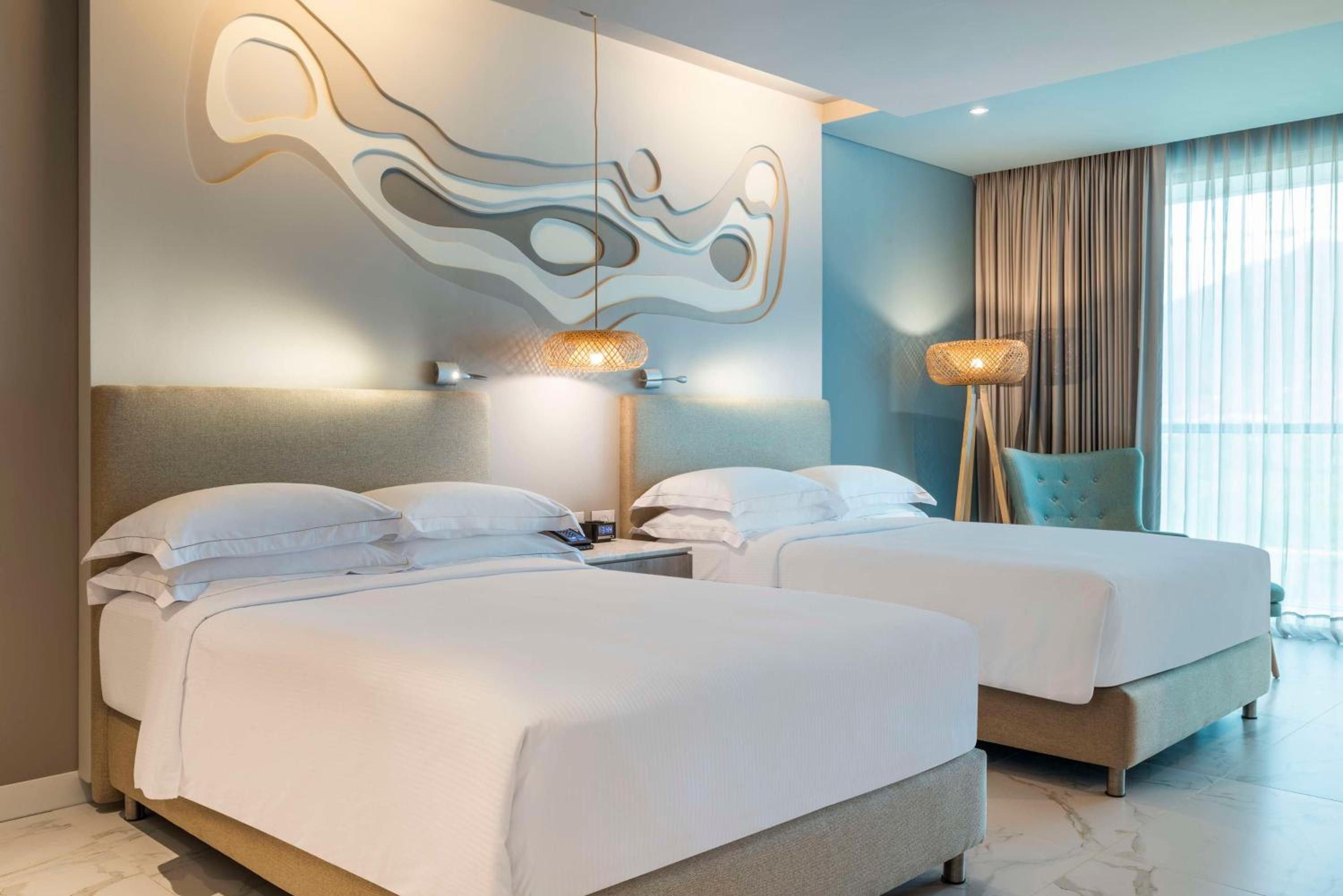 Double Room with Two Double Beds and Balcony - Ocean View photo 1