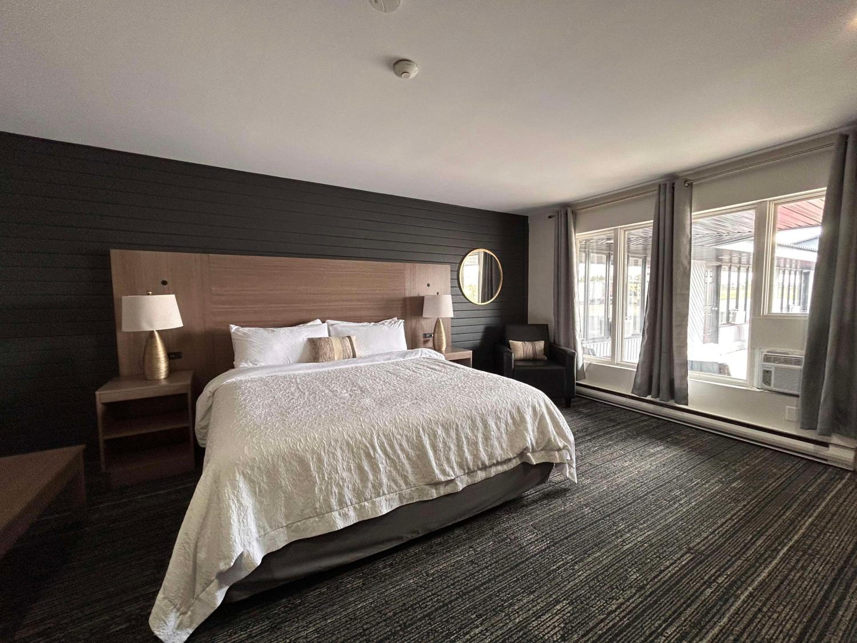 Suite with One King and One Double Bed with Kitchenette and Living Room - Non-Smoking
